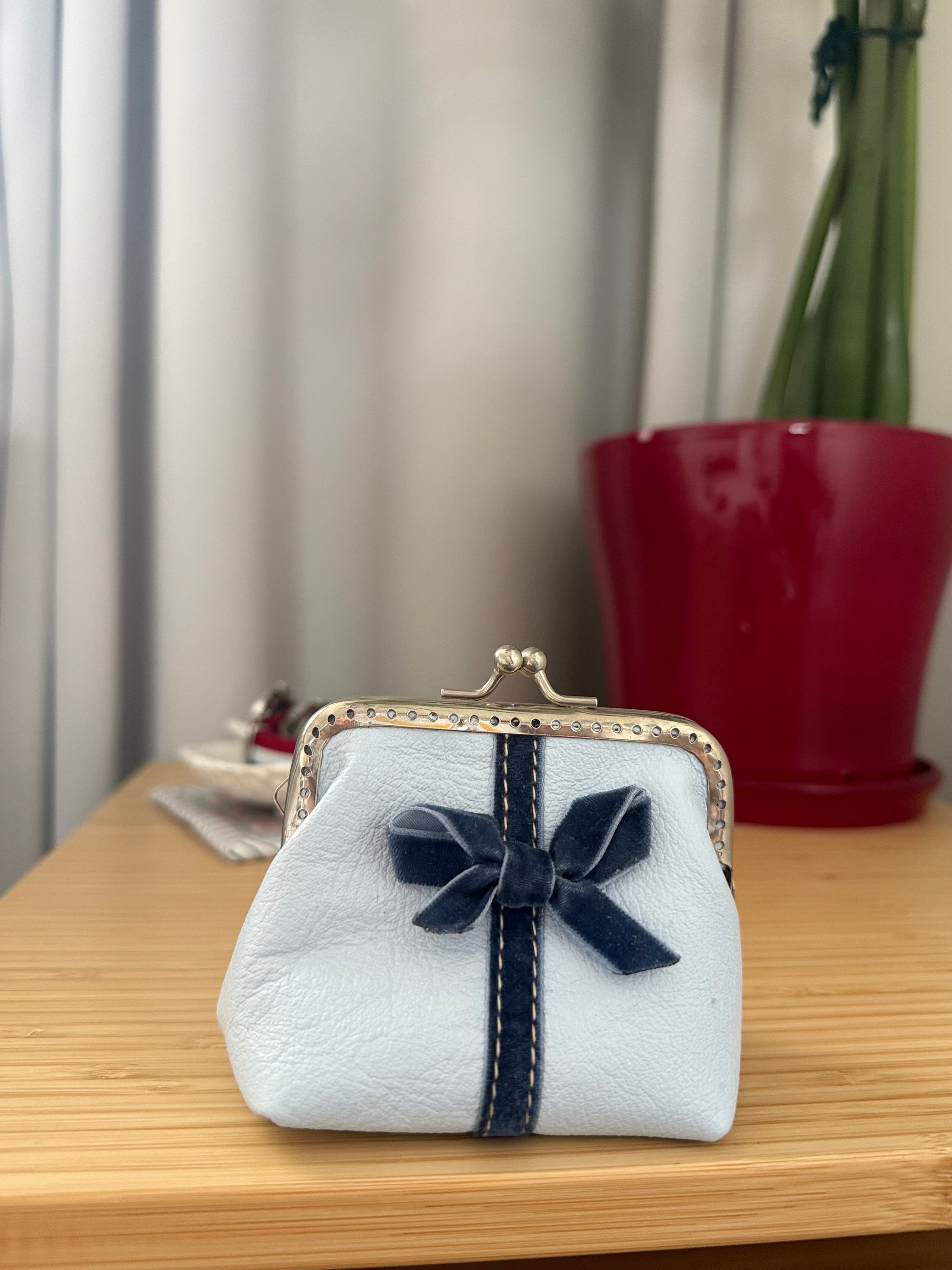 Coin purse with bow accent