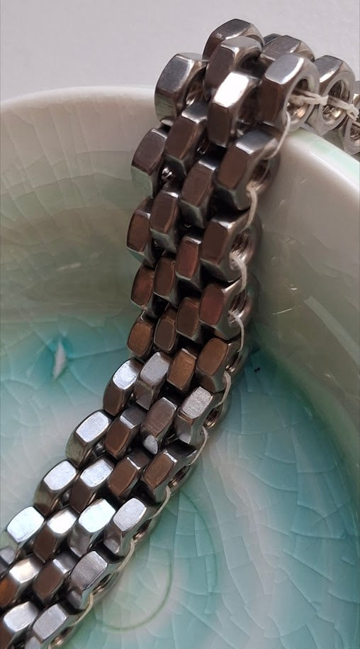 Unisex bracelet made with stainless steel hex nuts