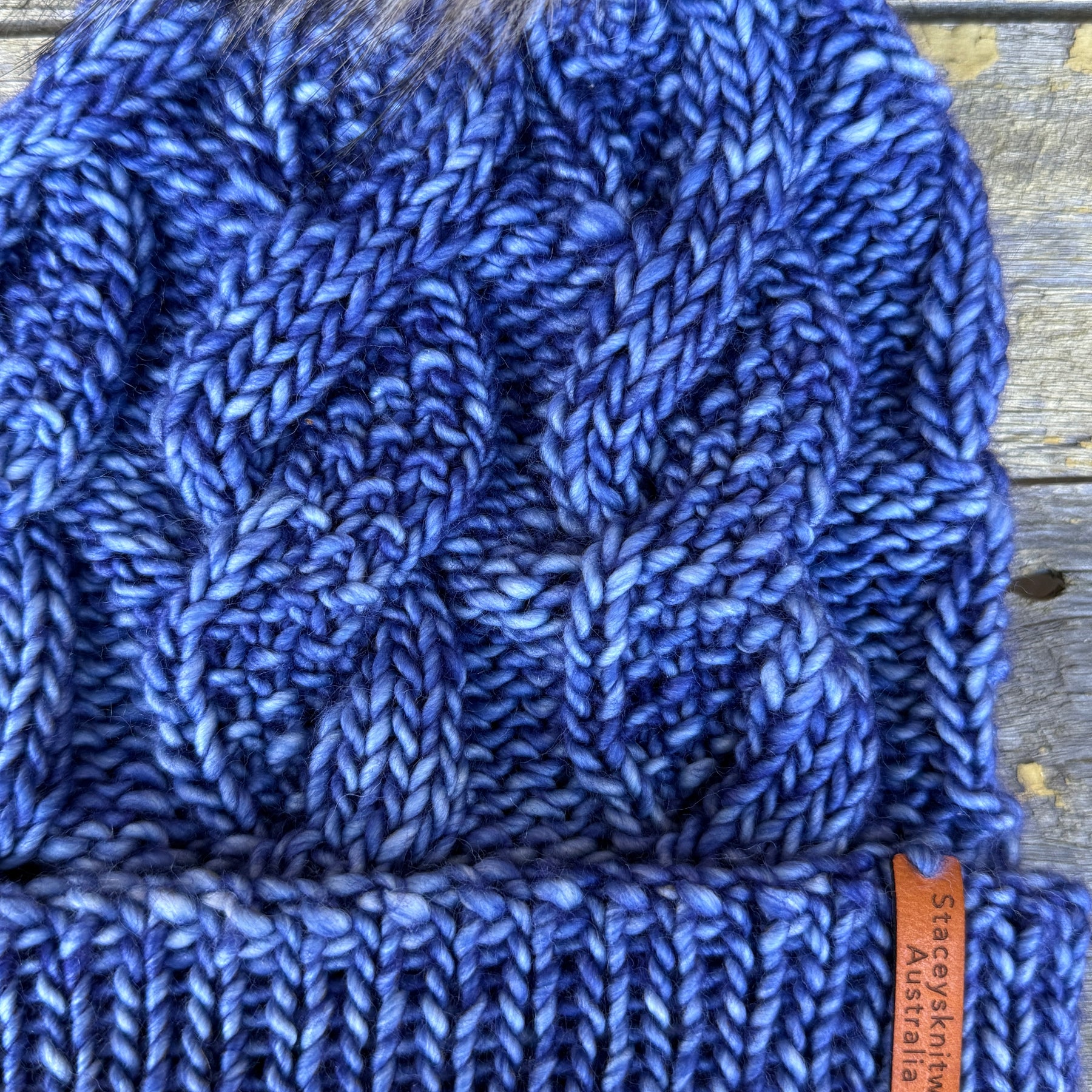 Hand knitted blue merino beanie, unisex cable PomPom beanie