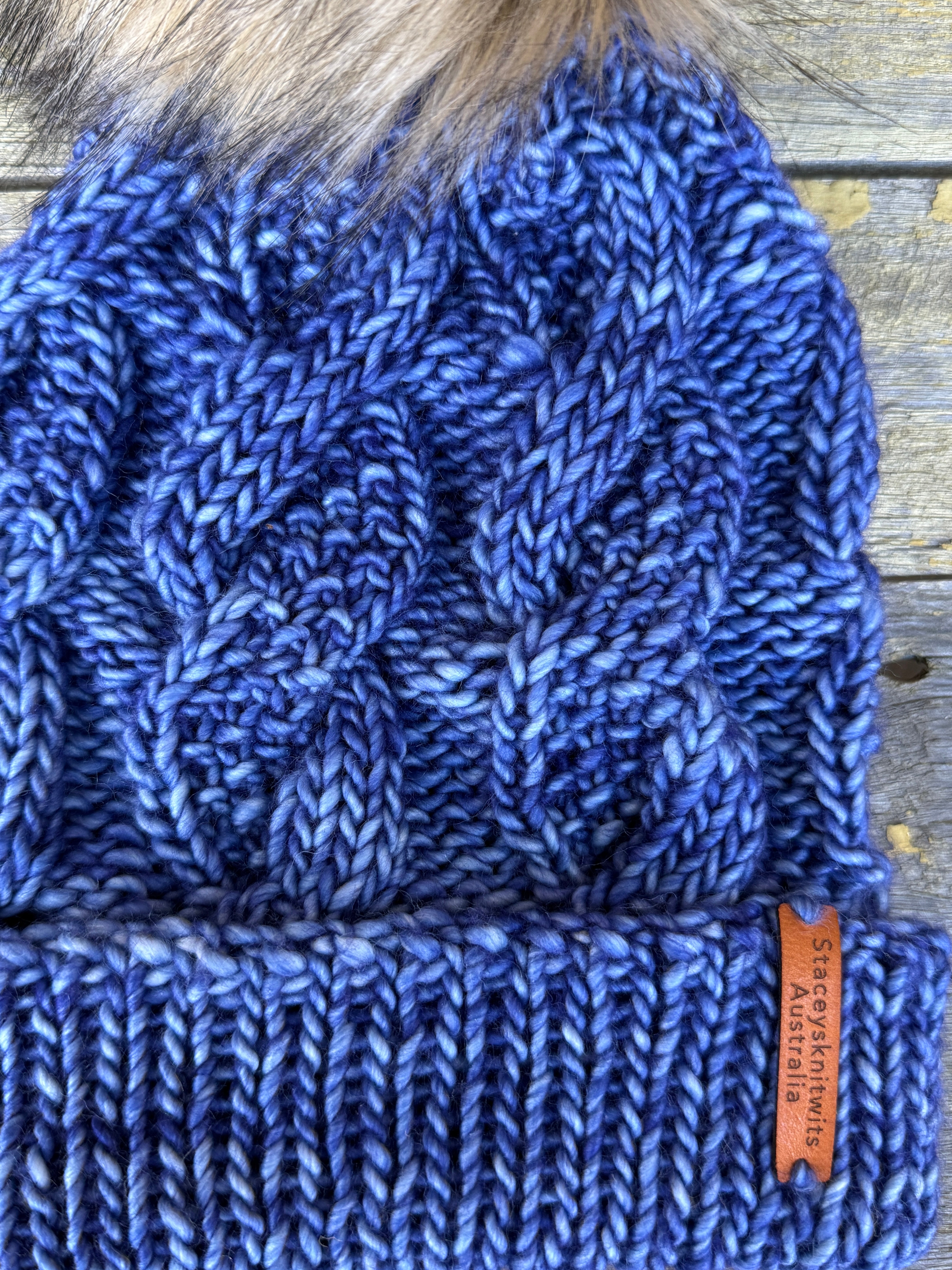 Hand knitted blue merino beanie, unisex cable PomPom beanie