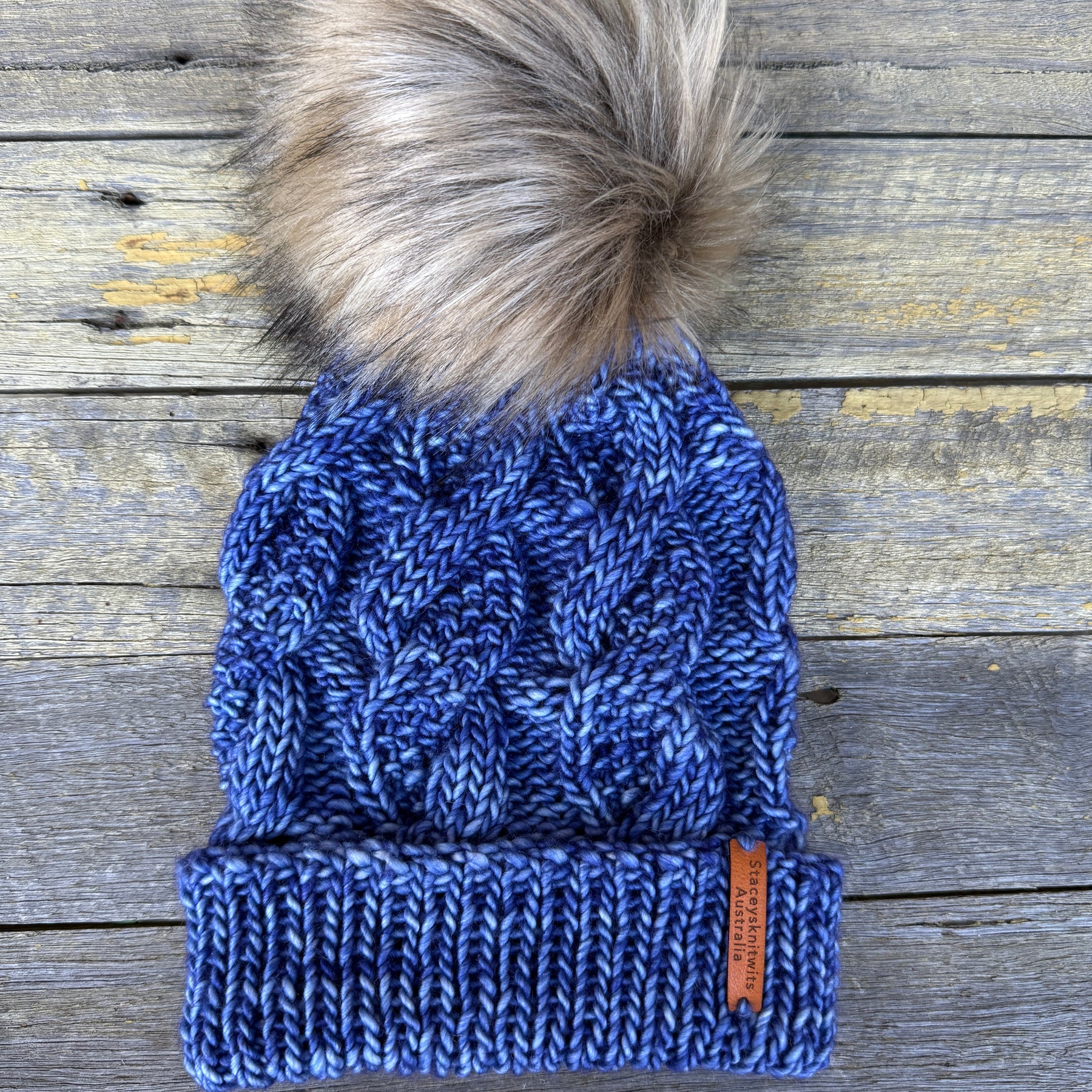 Hand knitted blue merino beanie, unisex cable PomPom beanie