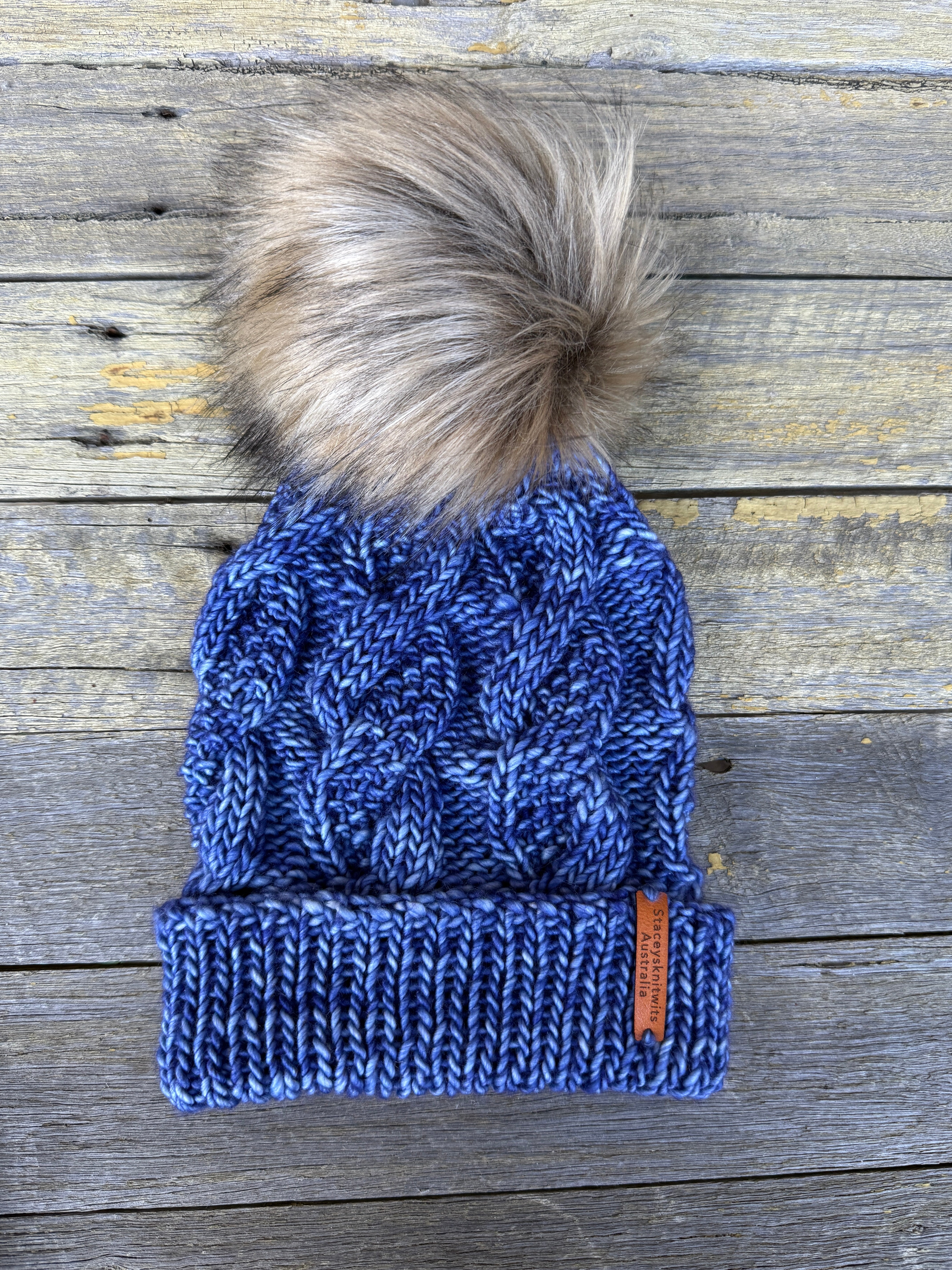 Hand knitted blue merino beanie, unisex cable PomPom beanie