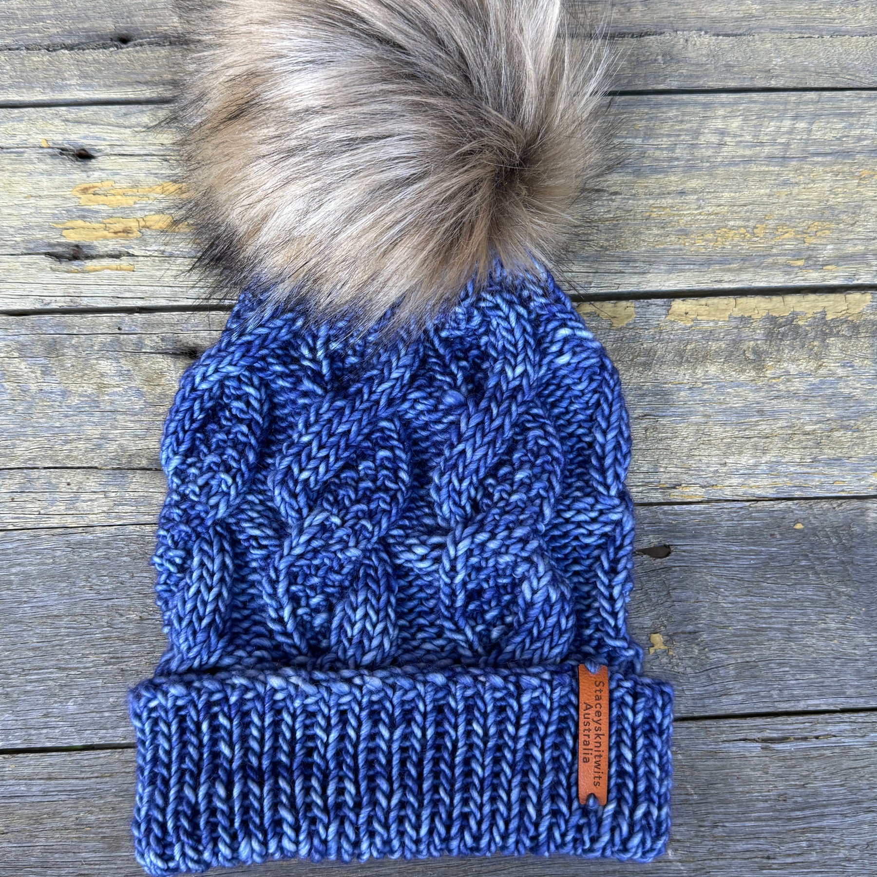 Hand knitted blue merino beanie, unisex cable PomPom beanie