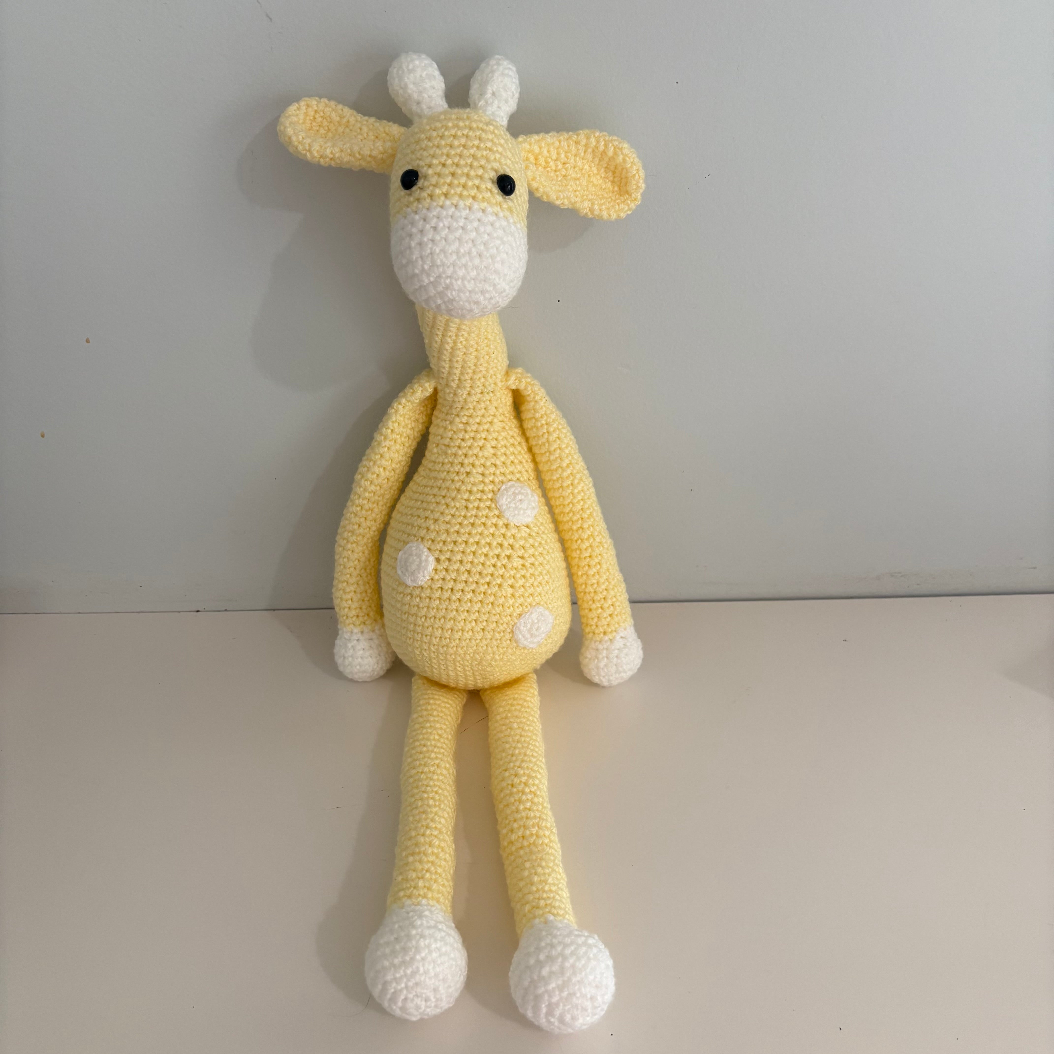 Long legged goofy giraffe crochet soft toy