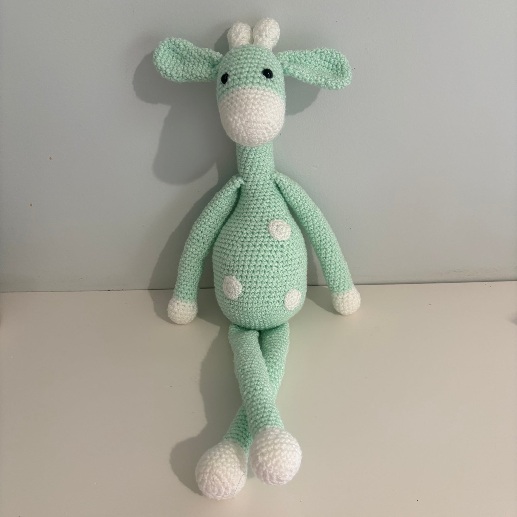 Long legged goofy giraffe crochet soft toy