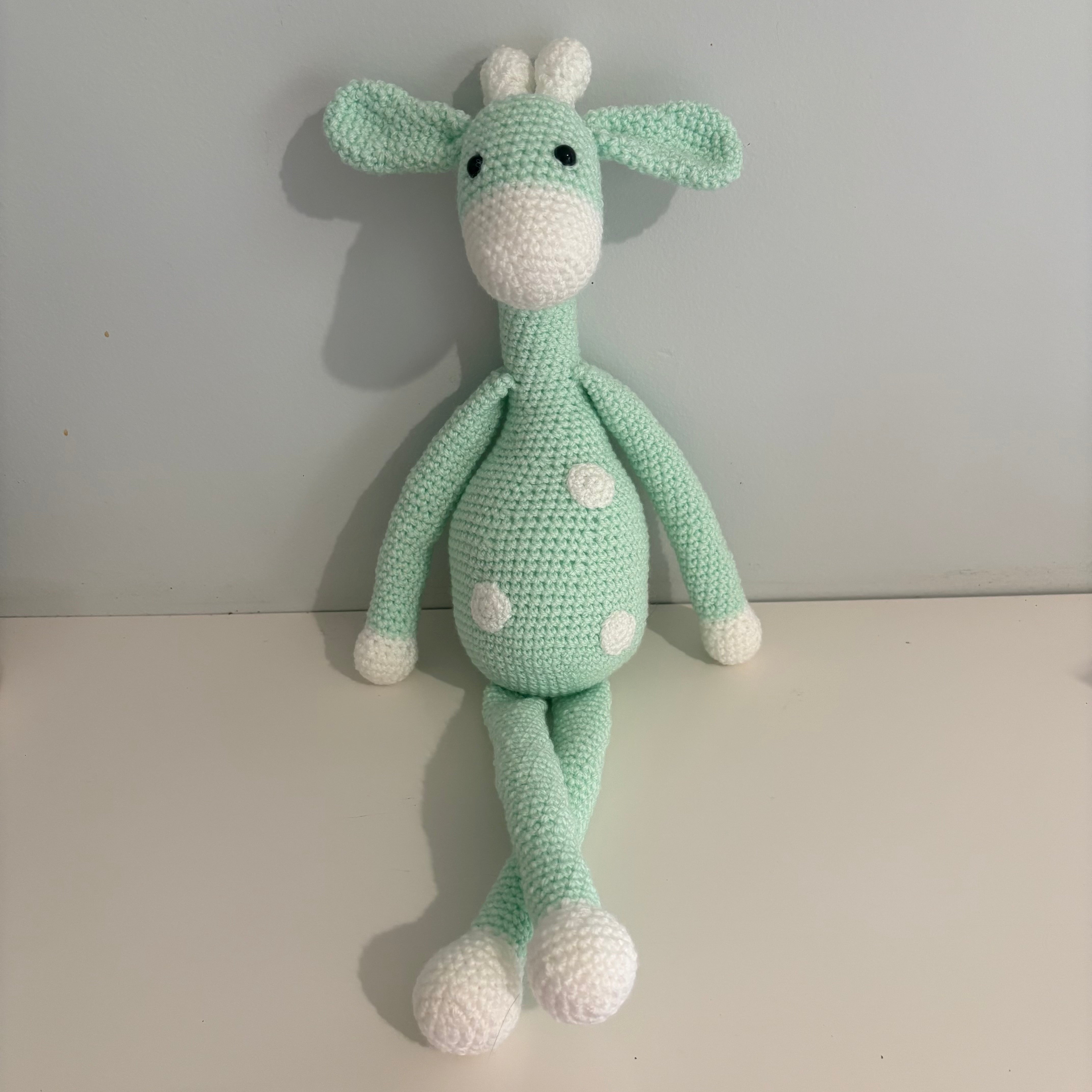 Long legged goofy giraffe crochet soft toy
