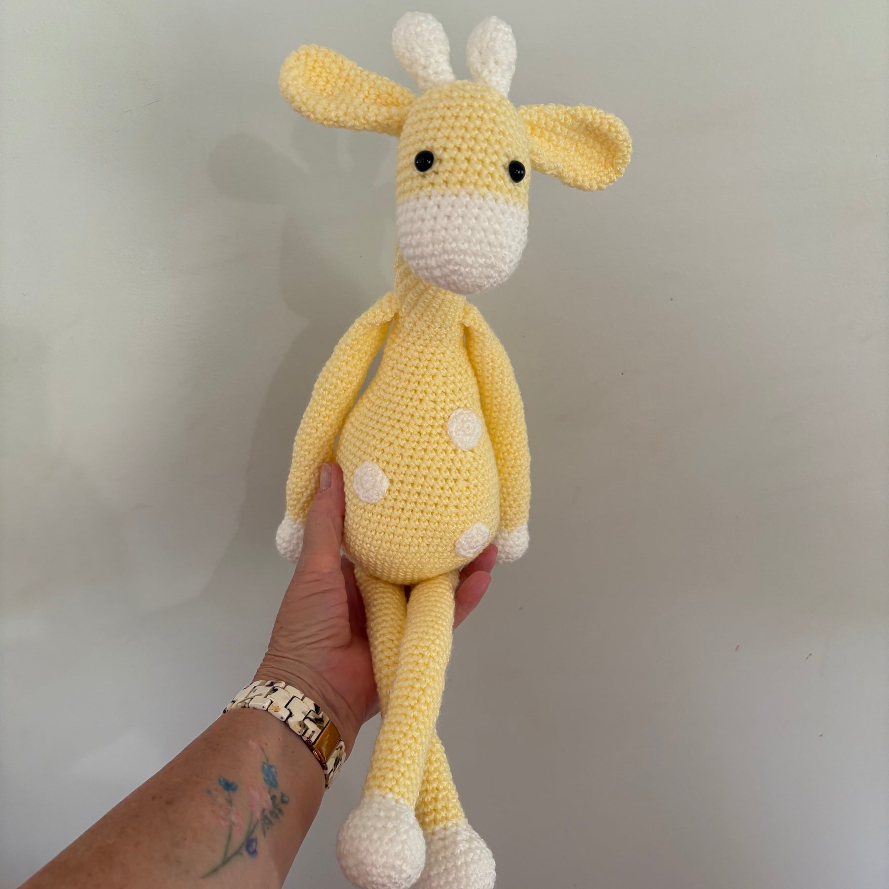 Long legged goofy giraffe crochet soft toy