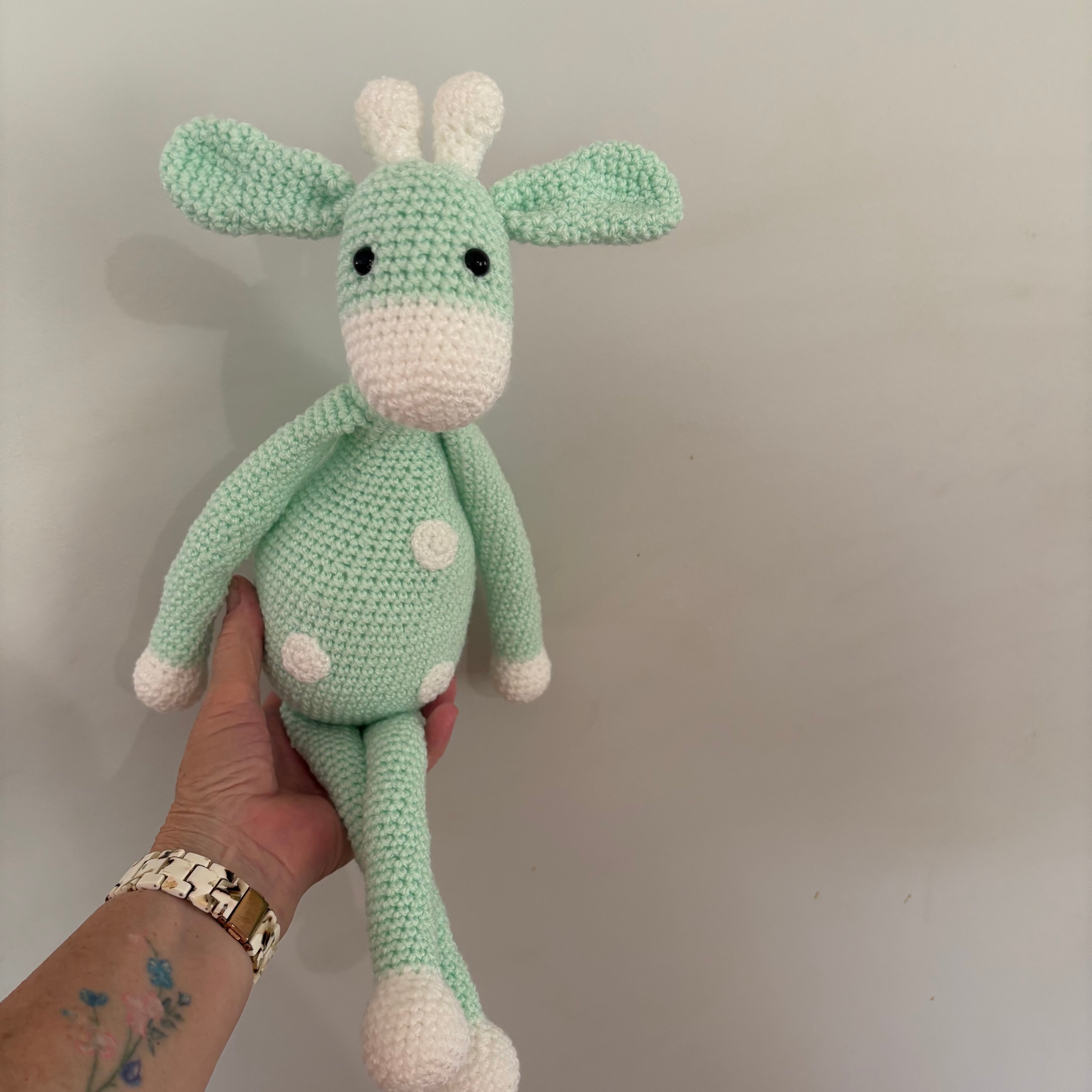 Long legged goofy giraffe crochet soft toy