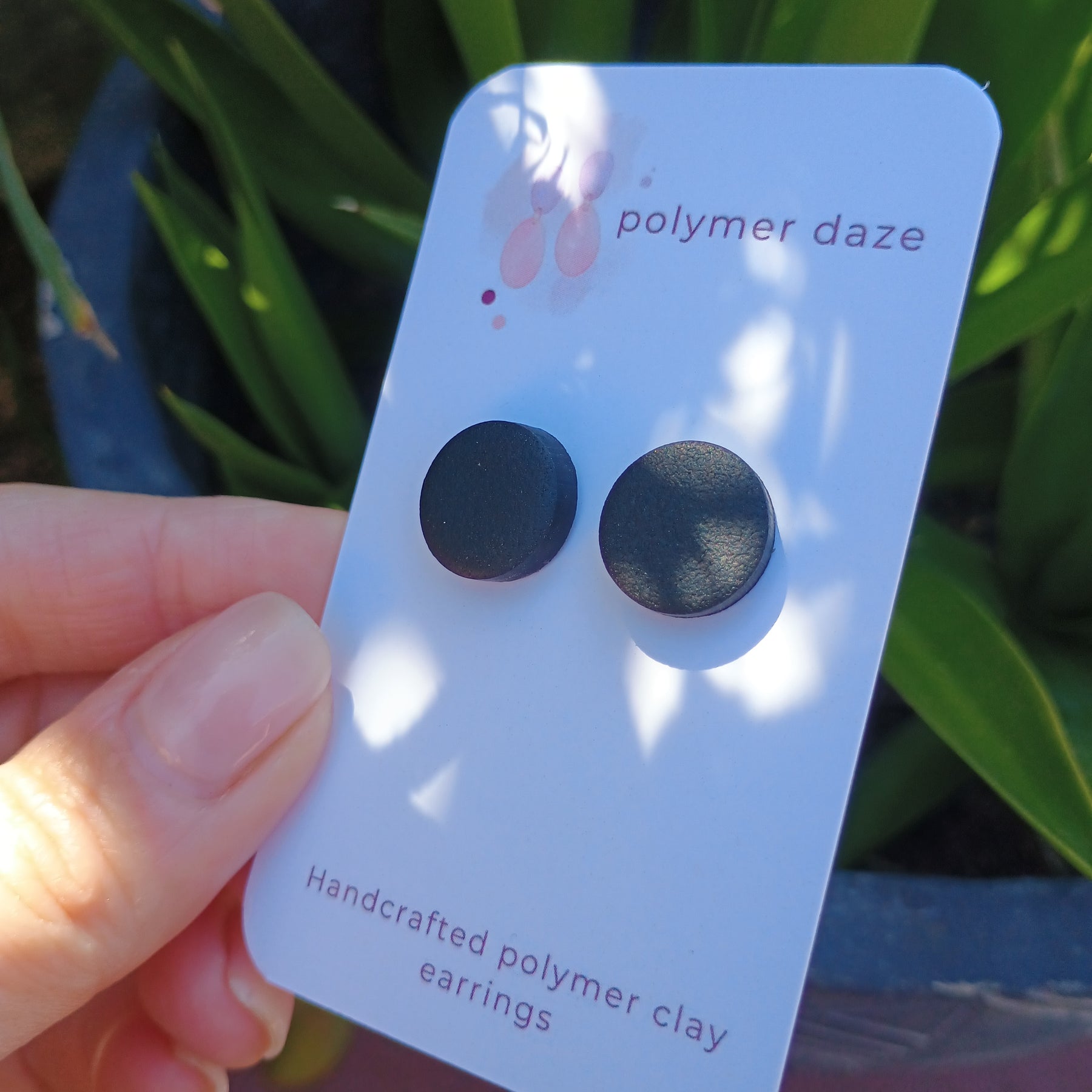 Chunky black stud earrings