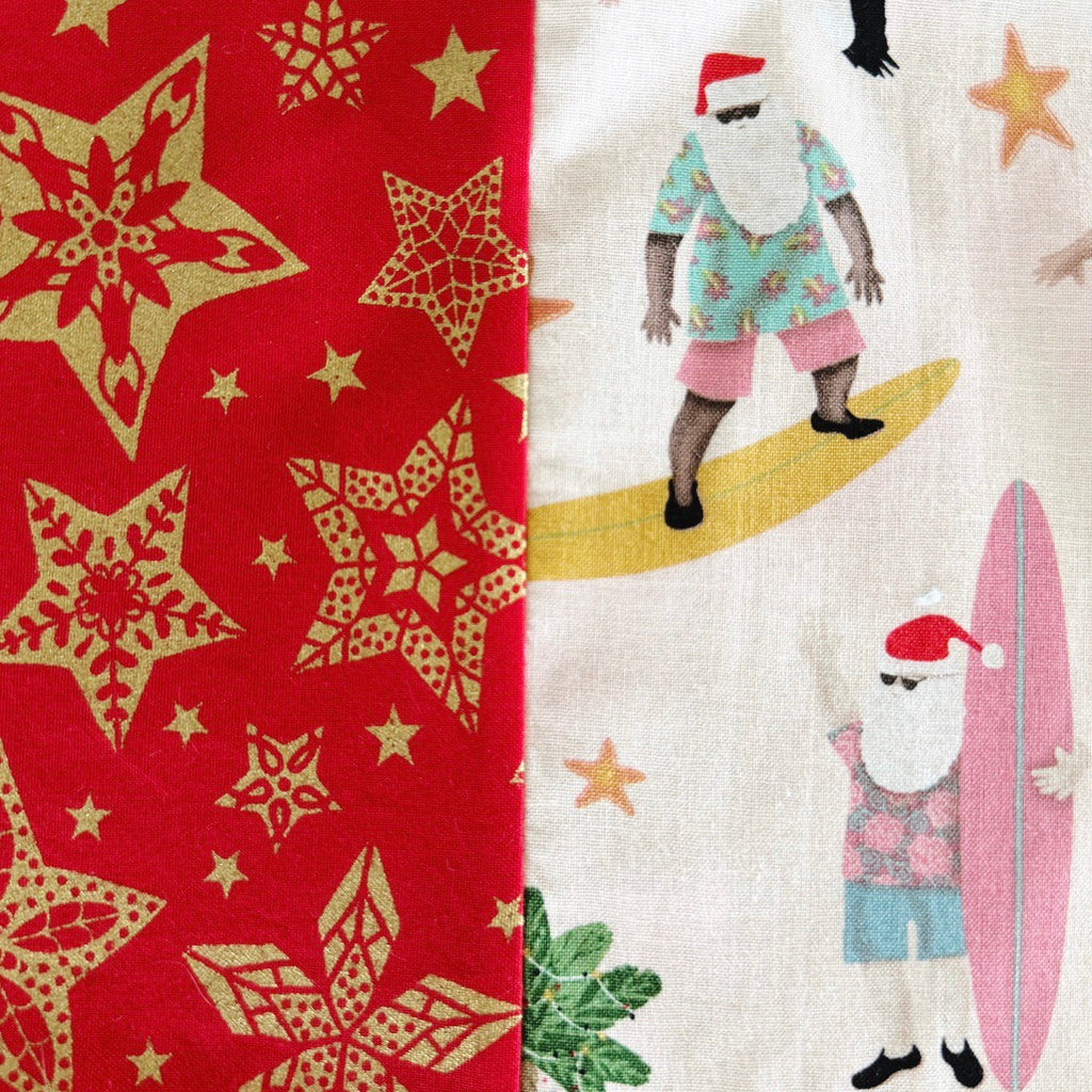 Surfing Santas. Ladies' Christmas tie back apron.