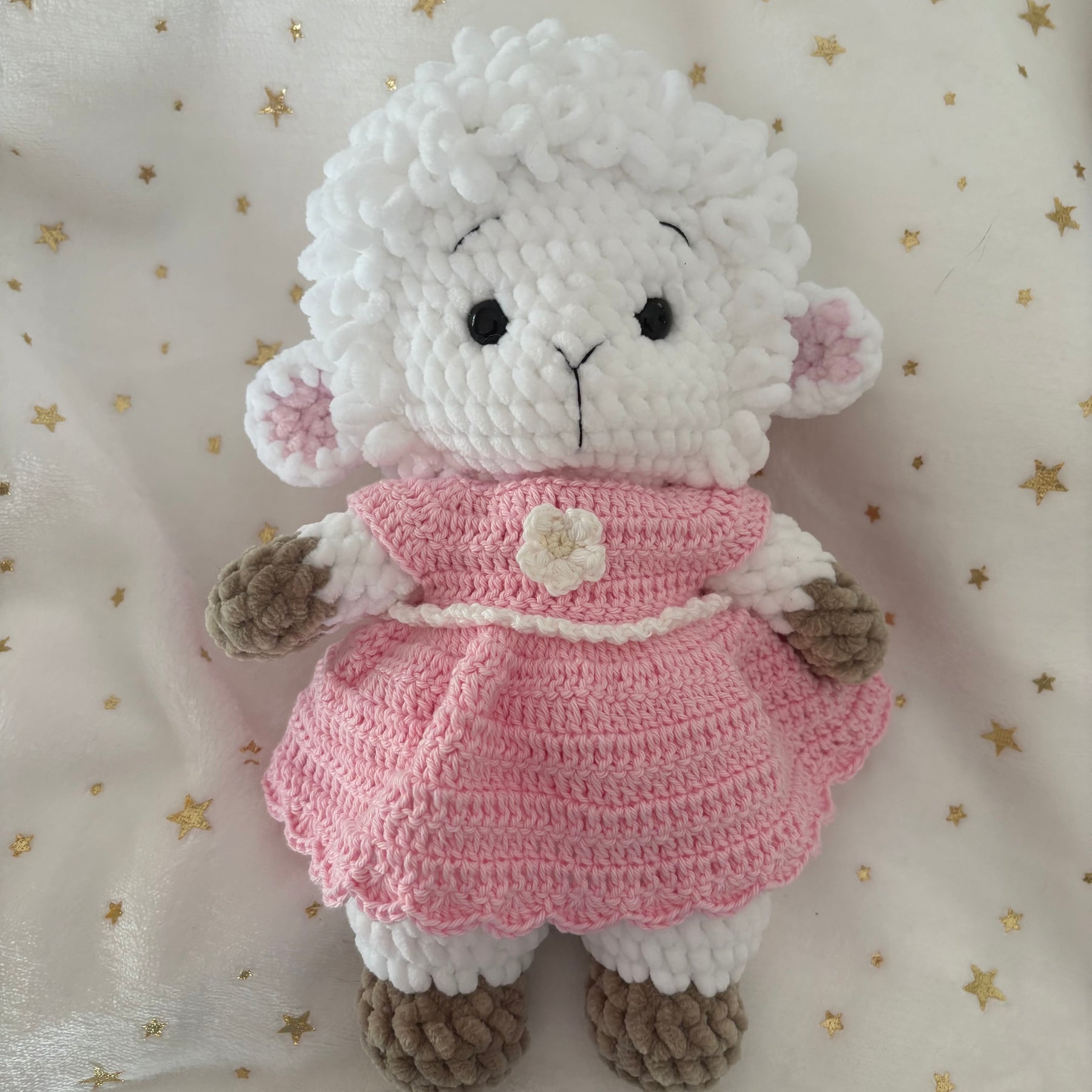 Crochet lamb in a pink dress