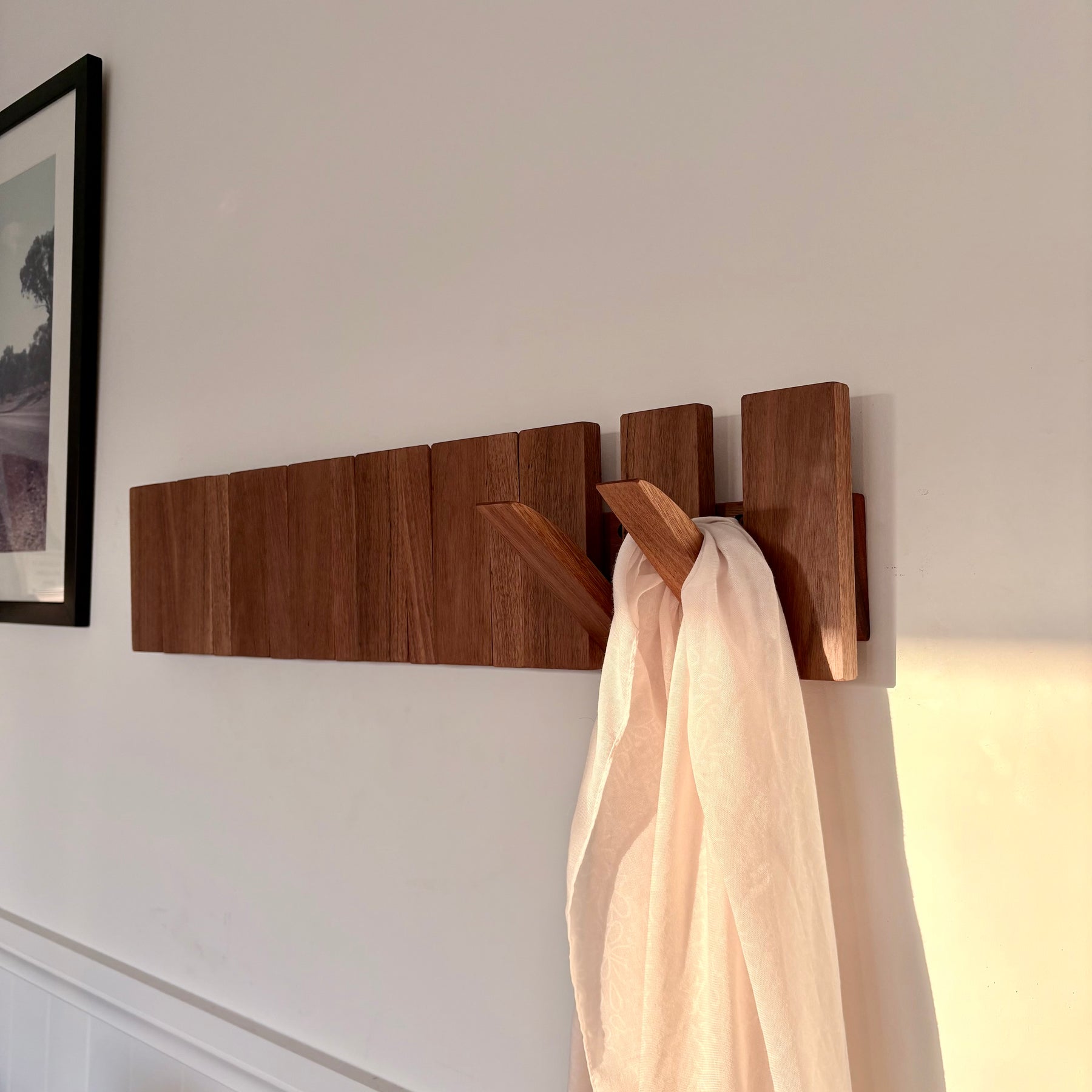 Grey box piano style coat rack