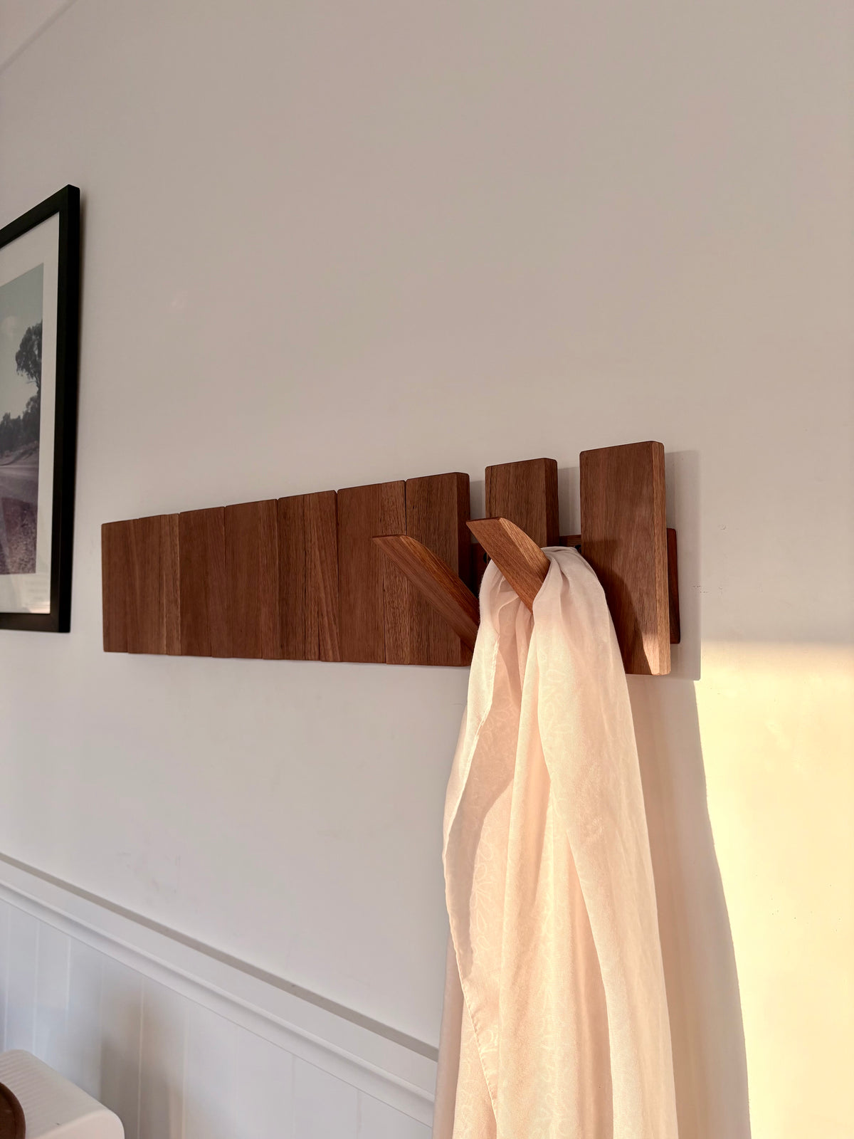Grey box piano style coat rack