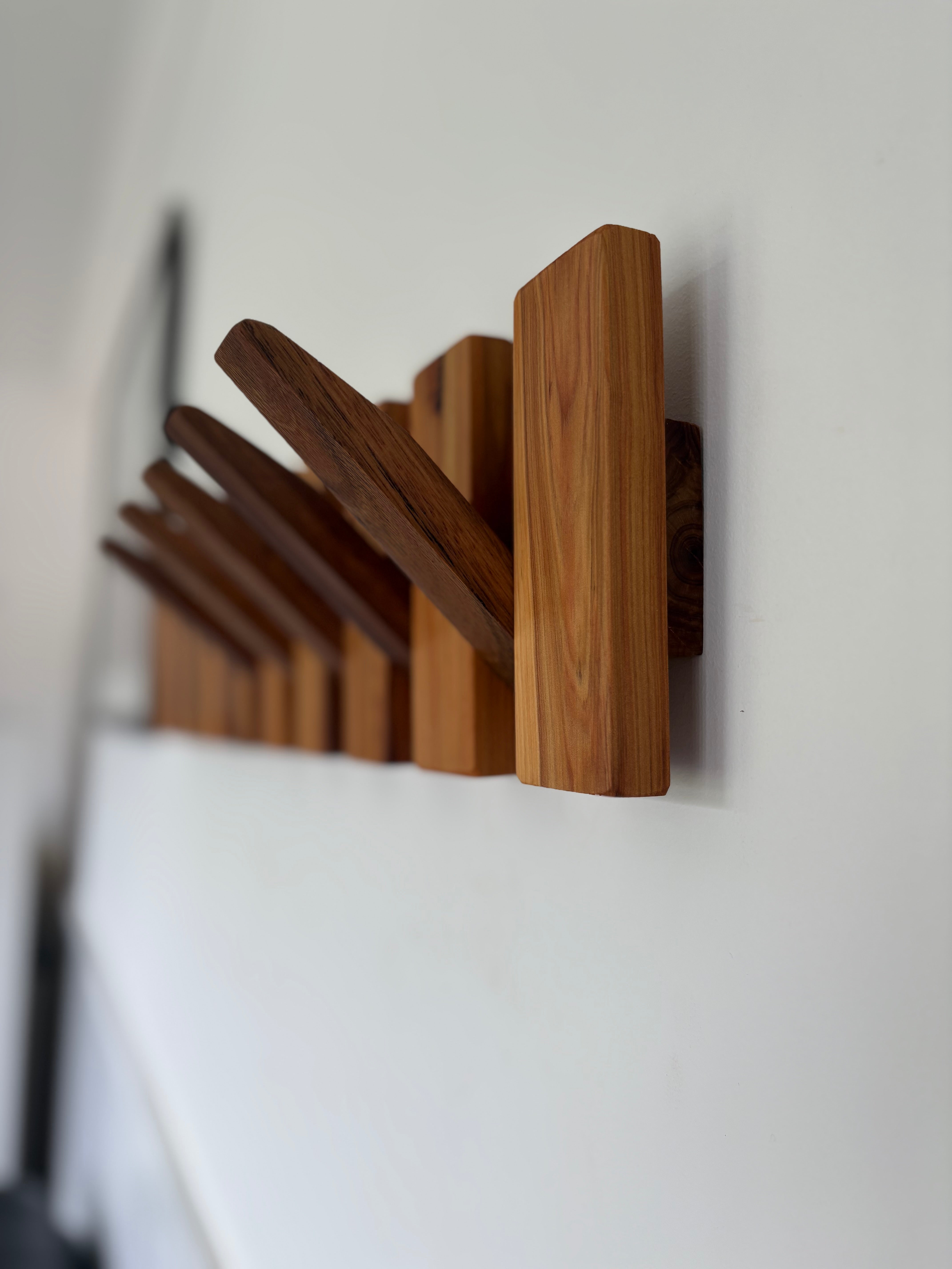 Two tone piano style coatrack