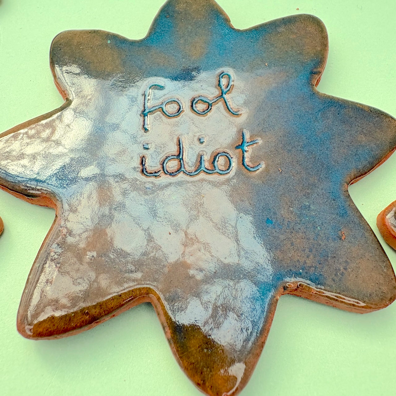 Ceramic coasters with words English/French