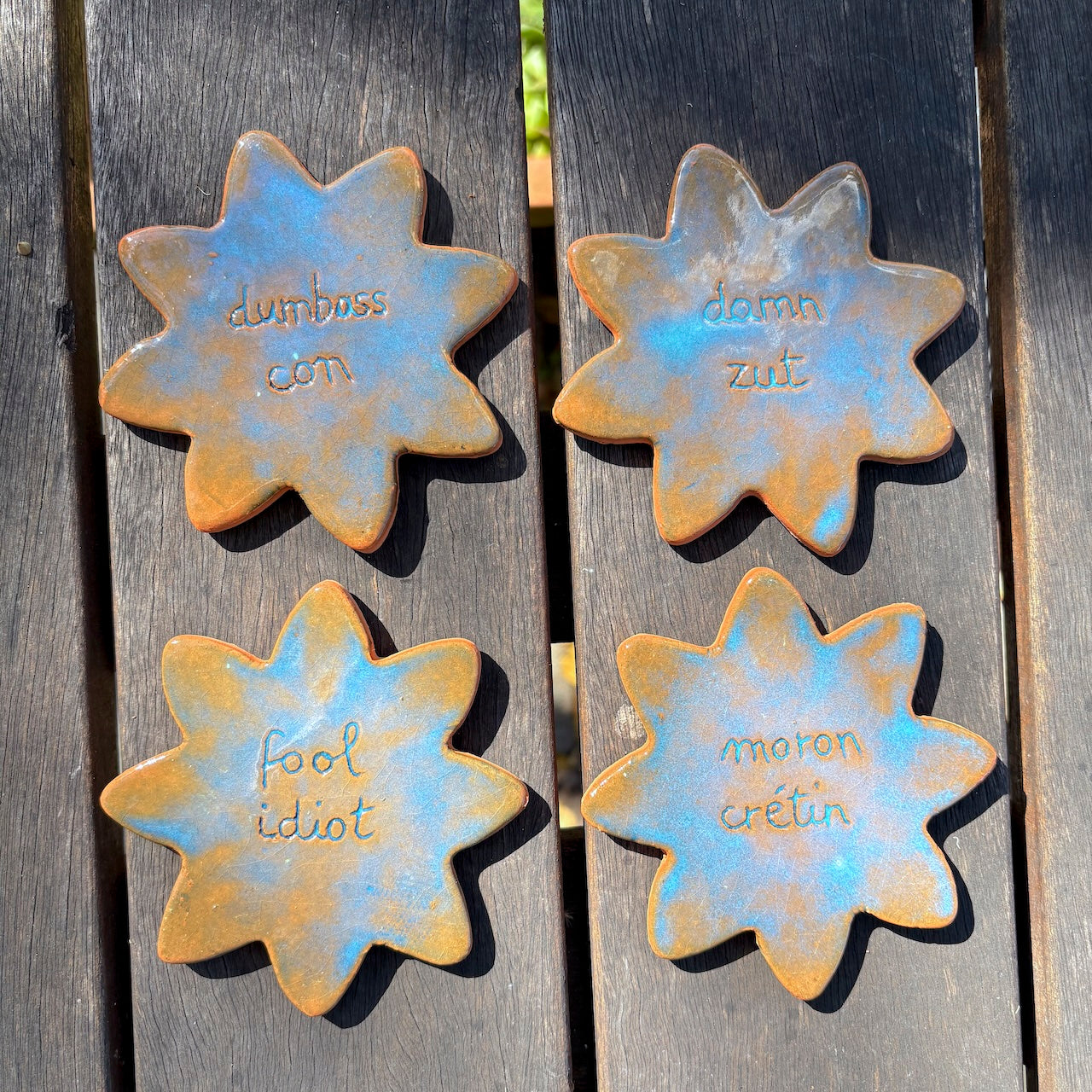 Ceramic coasters with words English/French