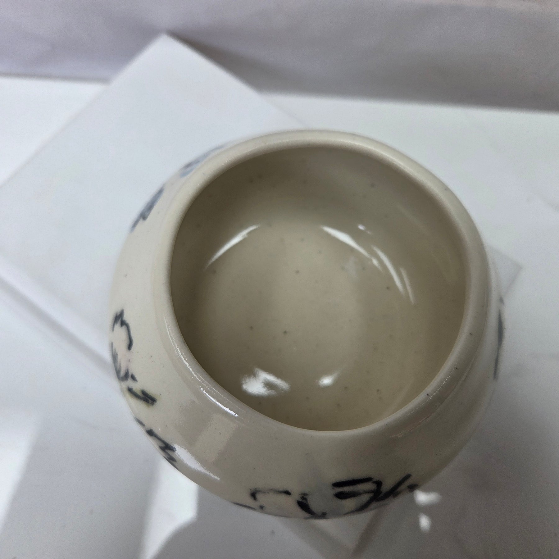 Wheel thrown ceramic Moon Bowl with hand painted flower detail