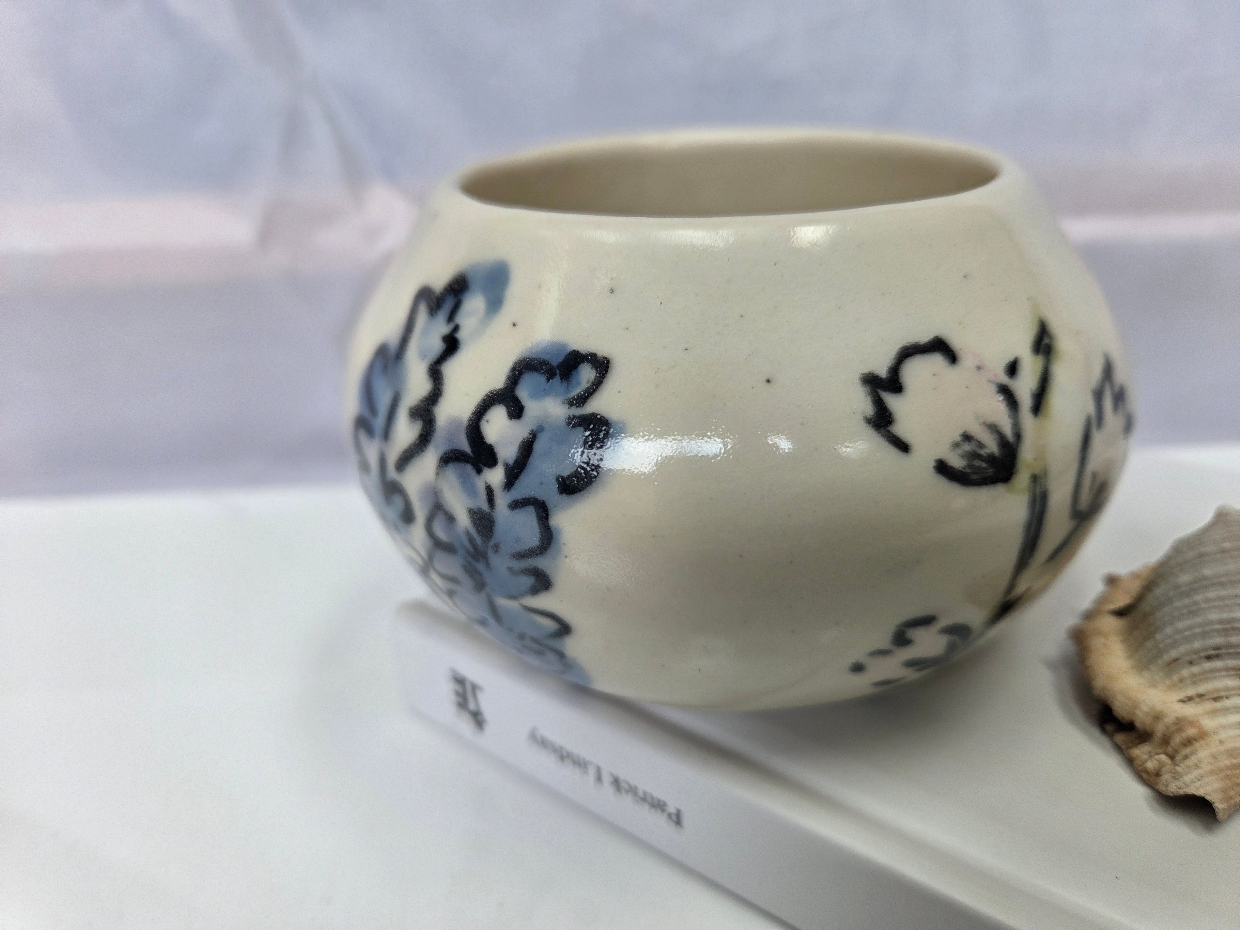 Wheel thrown ceramic Moon Bowl with hand painted flower detail
