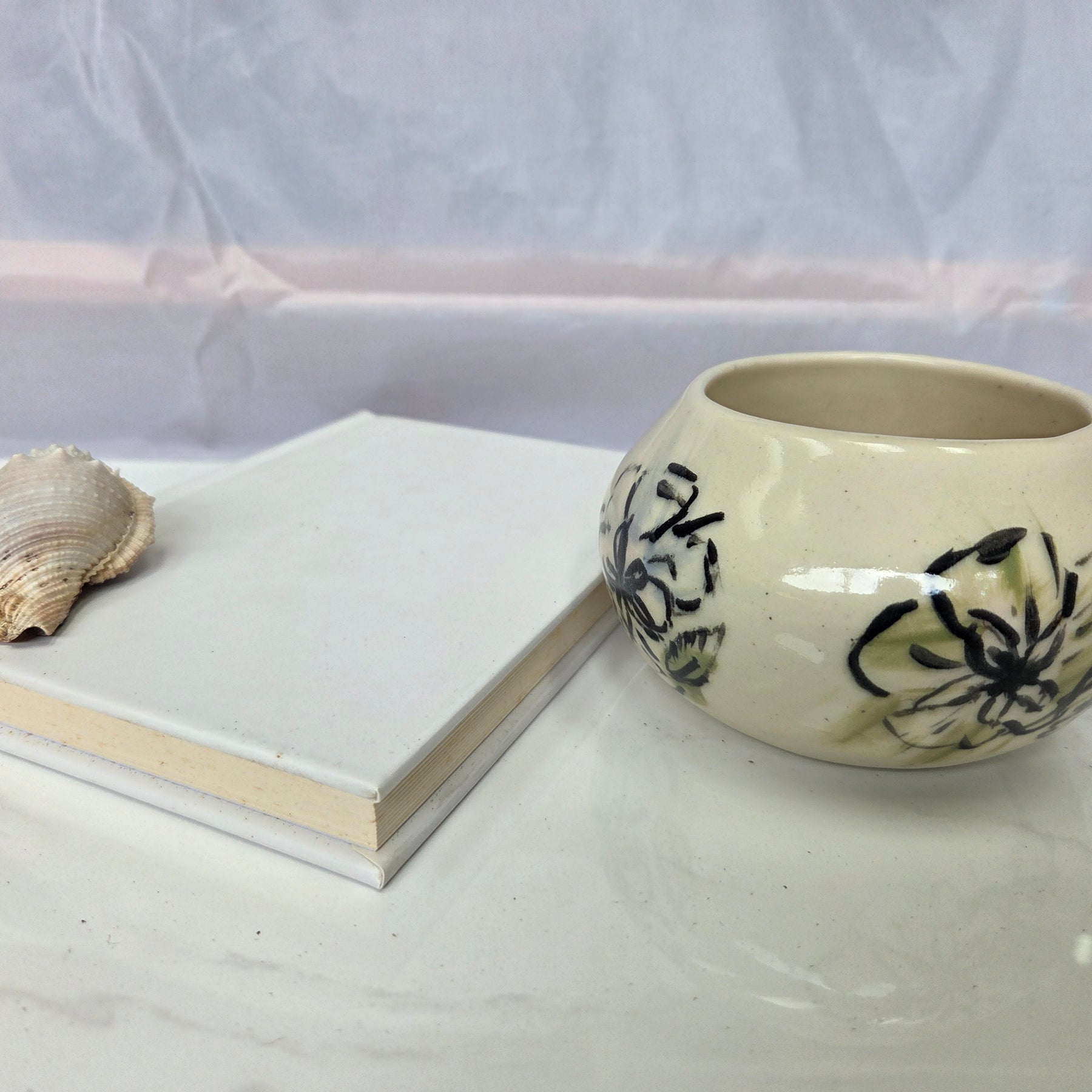 Wheel thrown ceramic Moon Bowl with hand painted flower detail