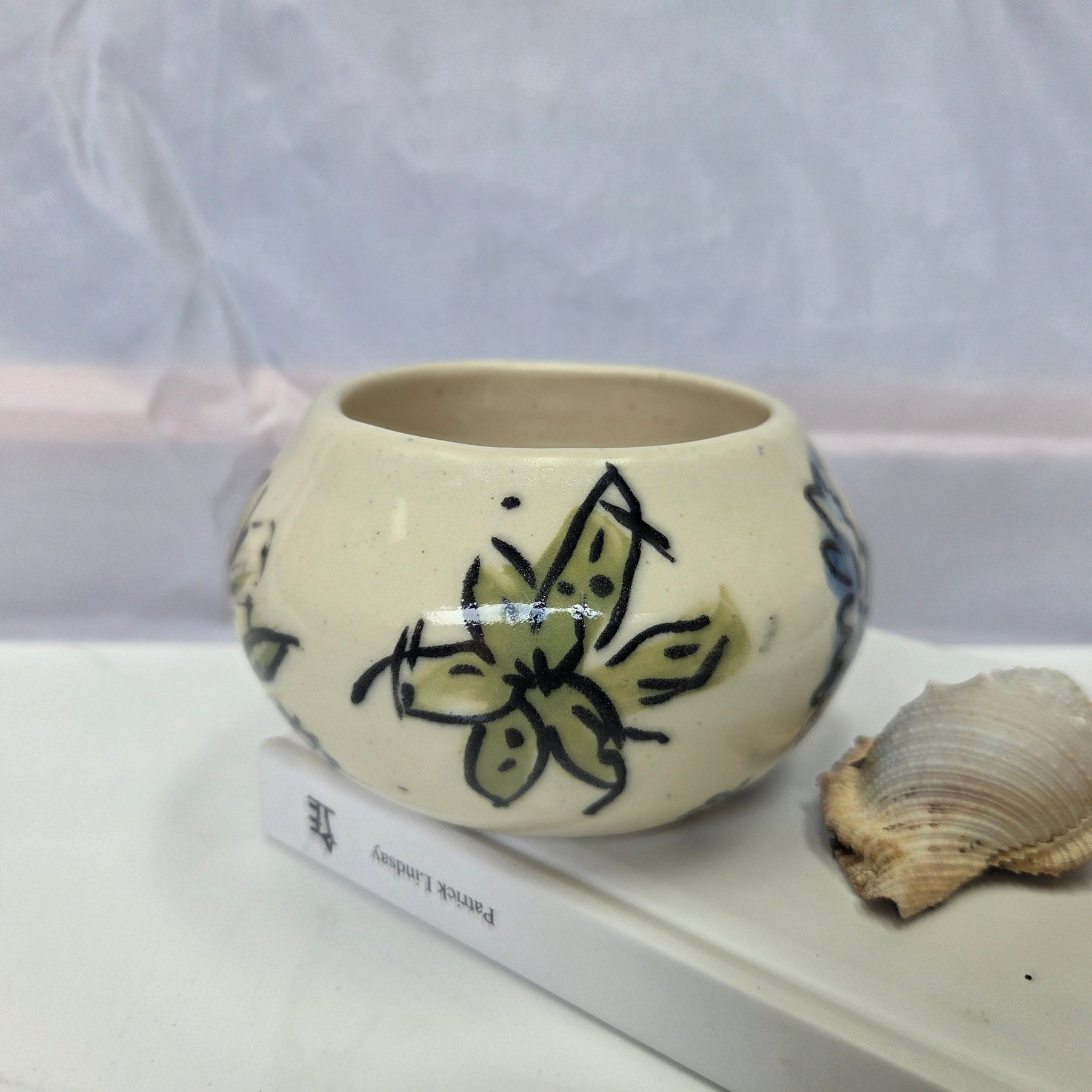 Wheel thrown ceramic Moon Bowl with hand painted flower detail