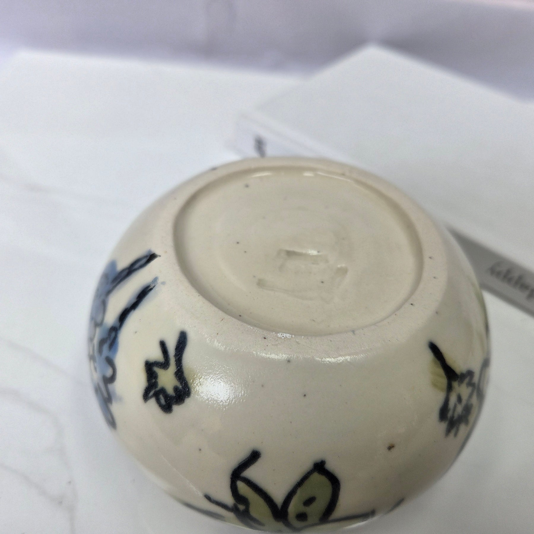 Wheel thrown ceramic Moon Bowl with hand painted flower detail