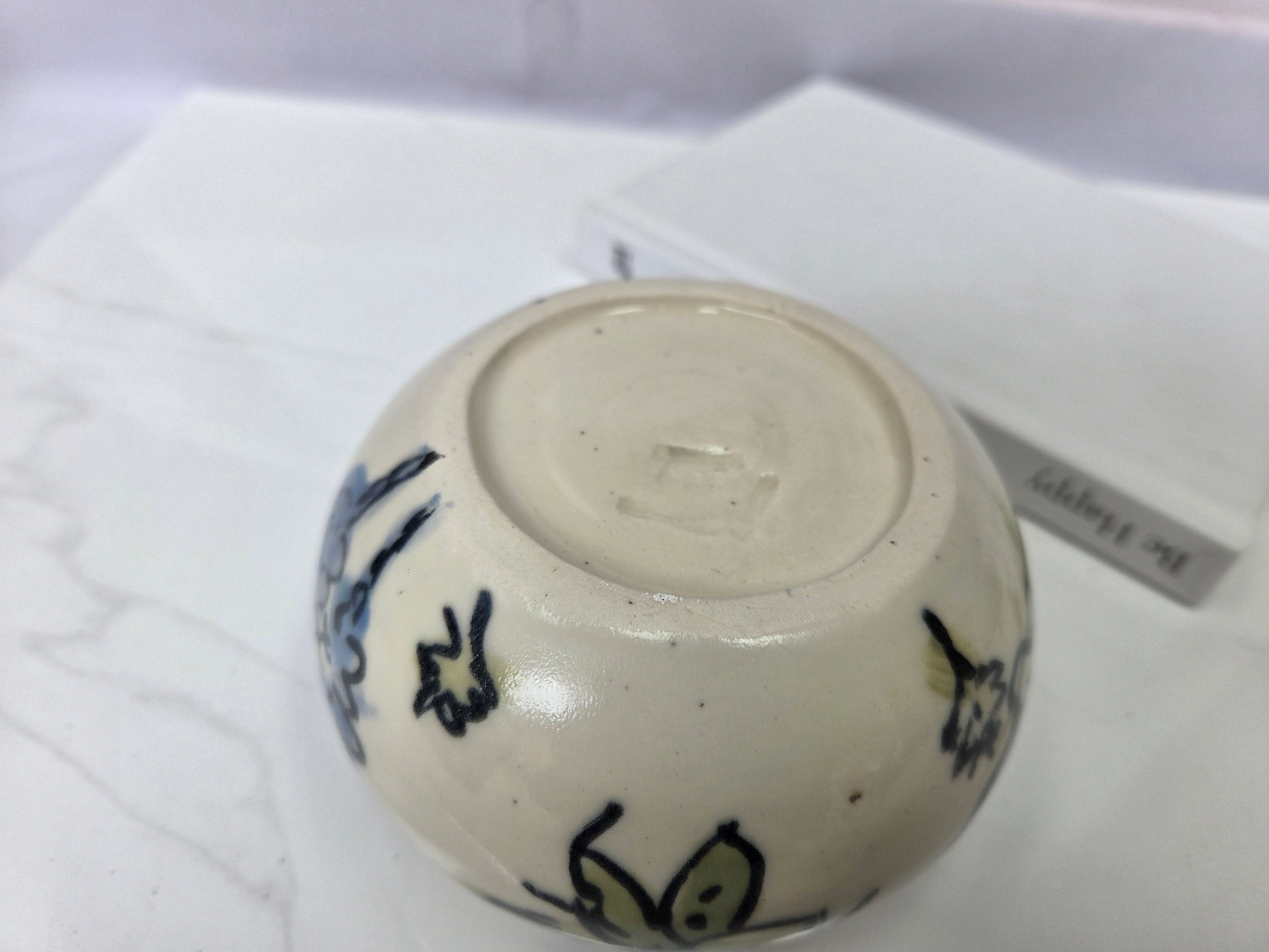 Wheel thrown ceramic Moon Bowl with hand painted flower detail