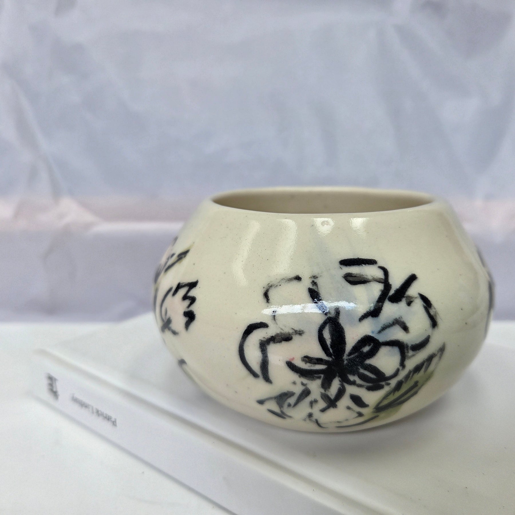 Wheel thrown ceramic Moon Bowl with hand painted flower detail
