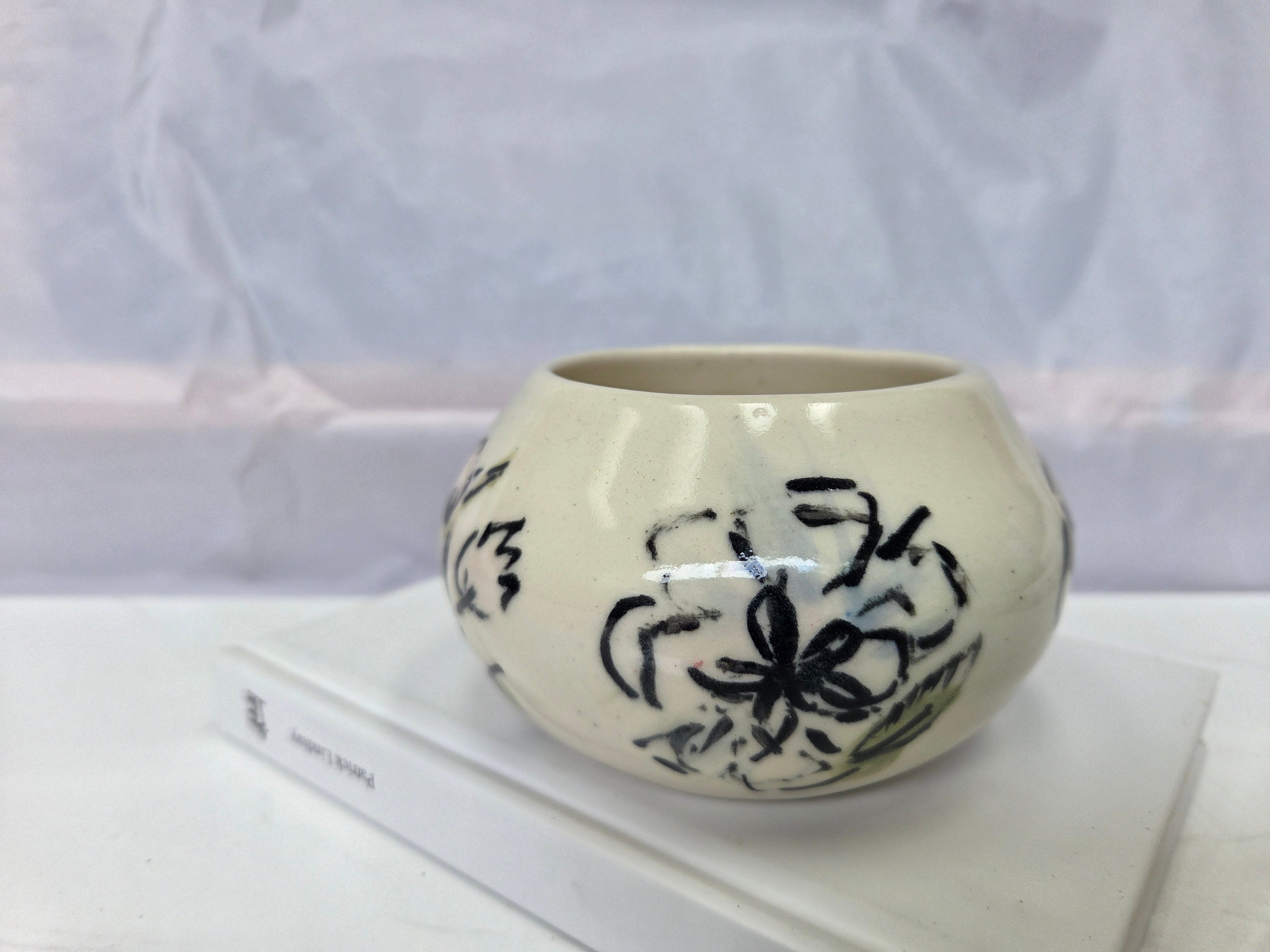 Wheel thrown ceramic Moon Bowl with hand painted flower detail