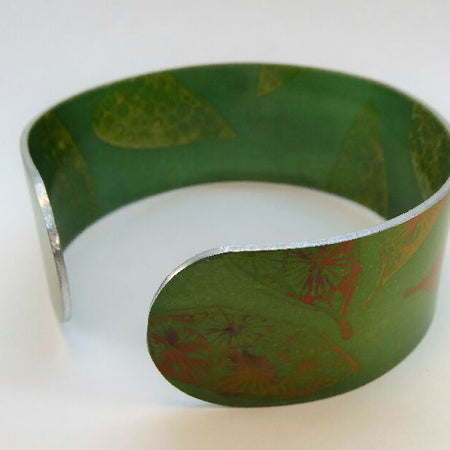 Printed and dyed grey and gold anodized aluminium bangle