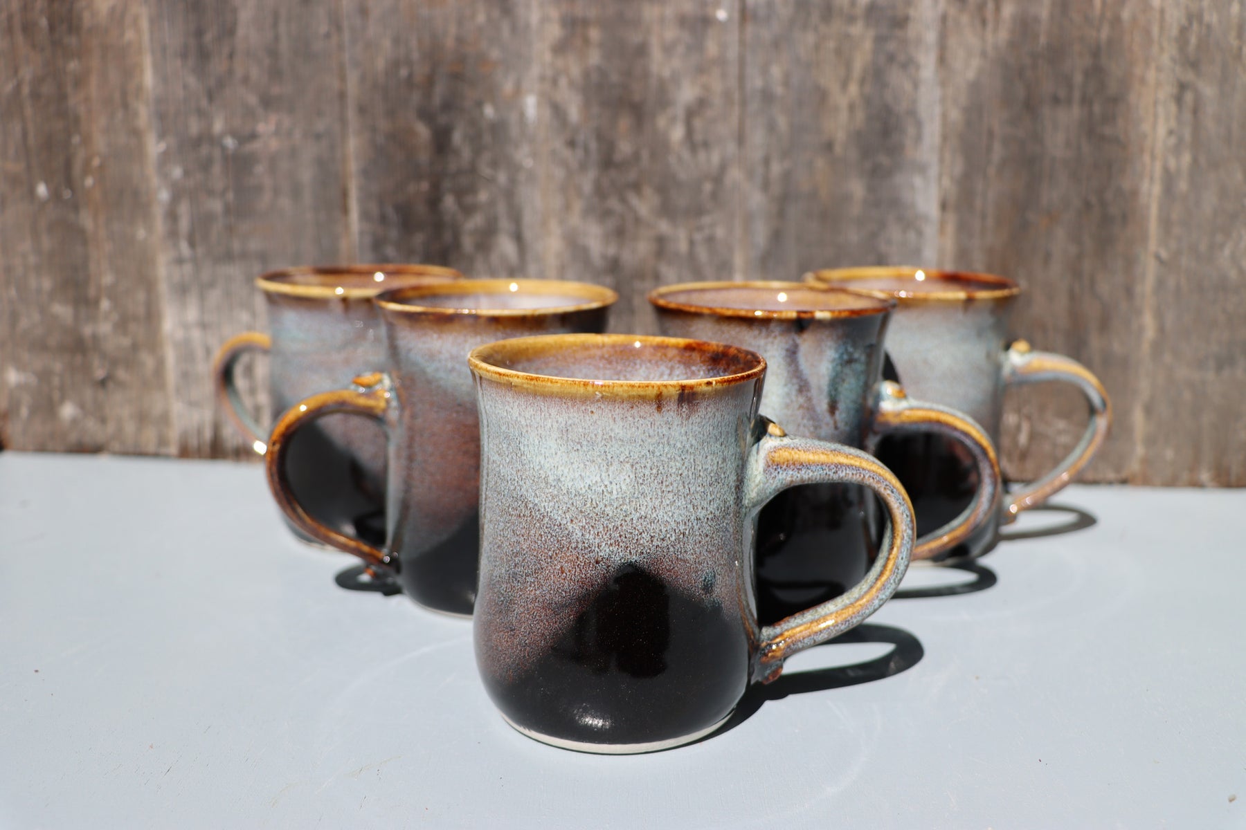Large hand made mugs in speckled brown and white