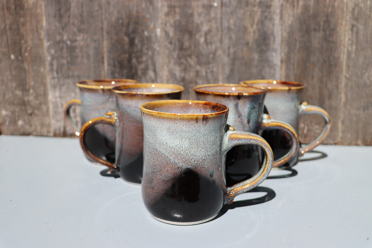 Large hand made mugs in speckled brown and white