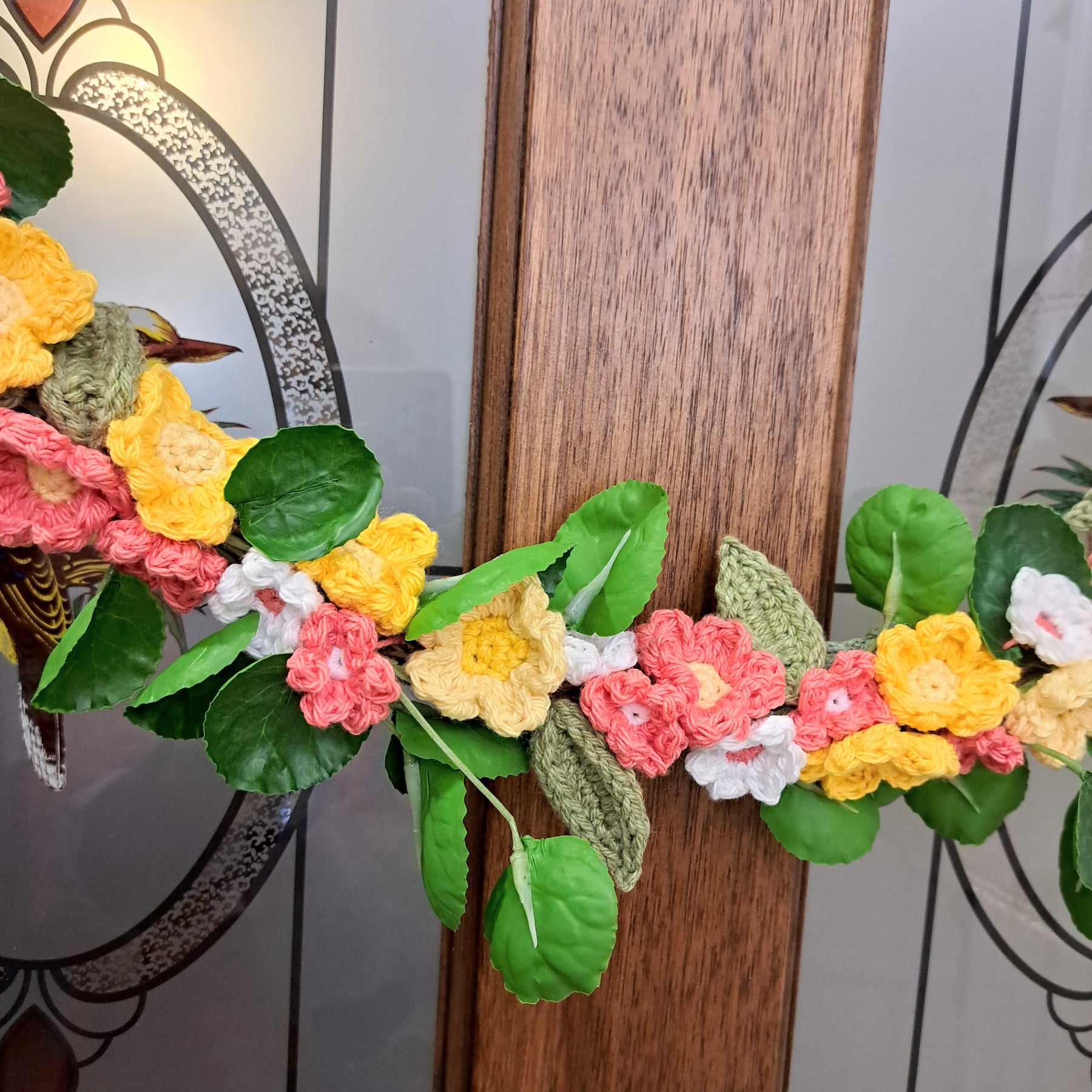 Handmade crochet spring flower wreath, yellows, pinks, white