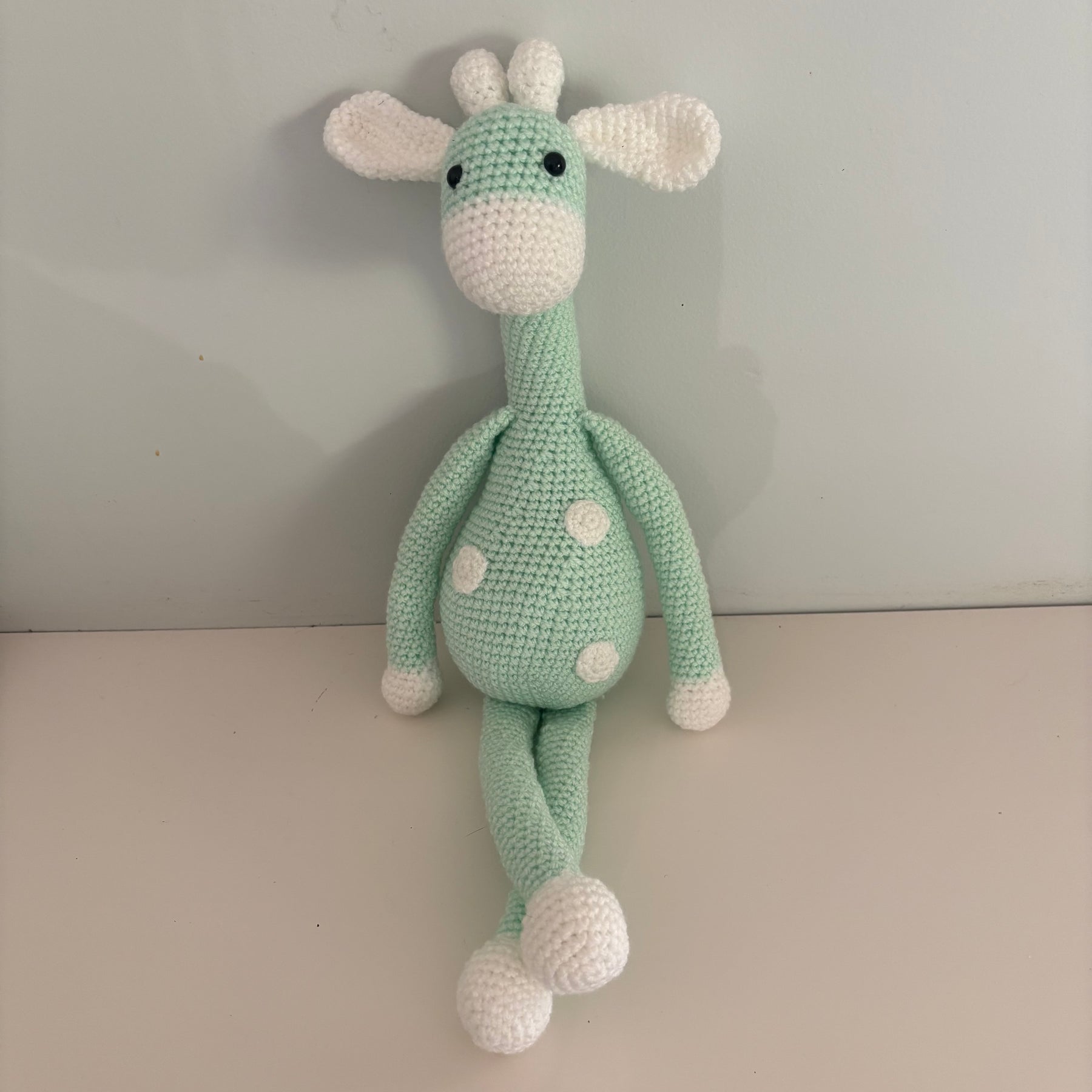 Long legged goofy giraffe crochet soft toy