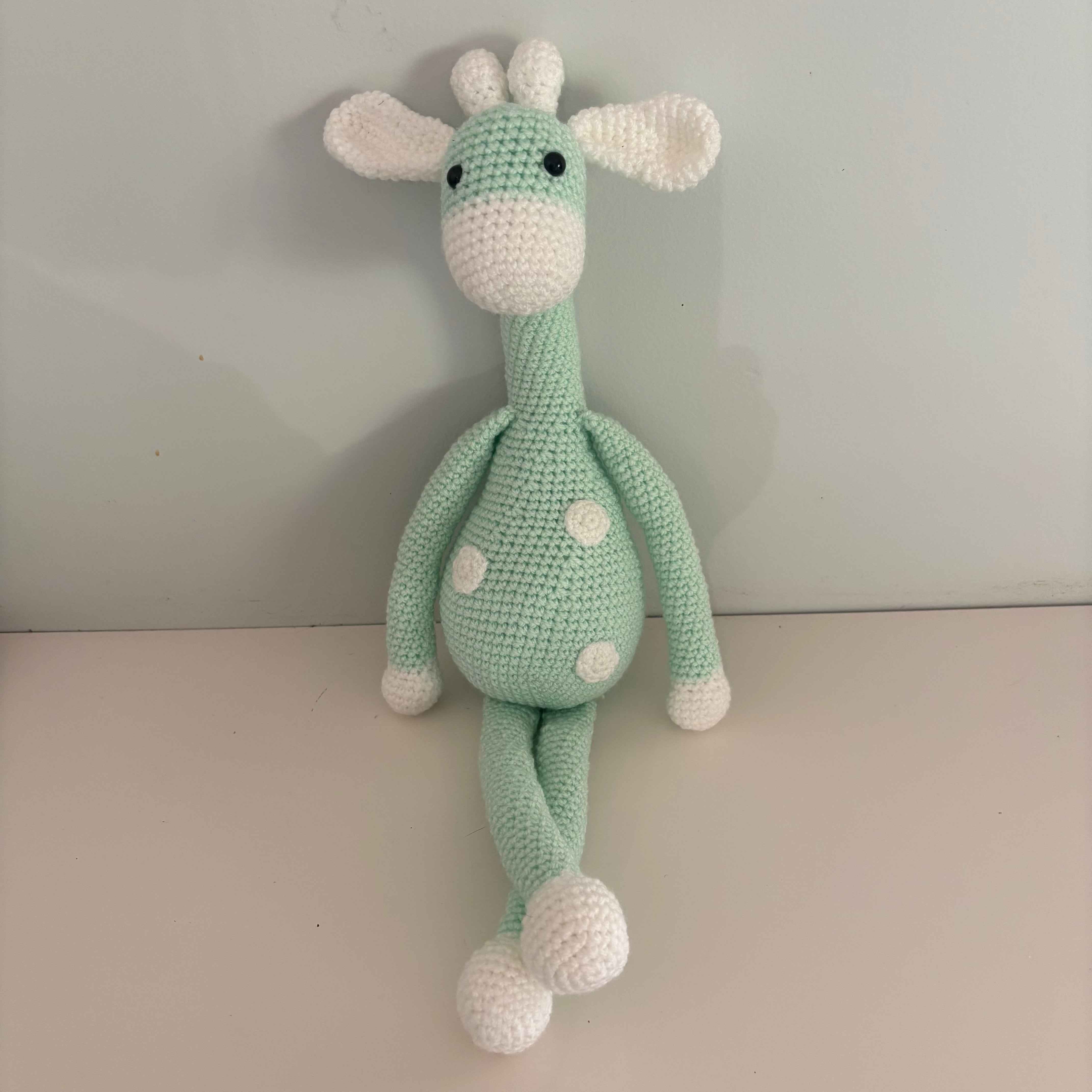 Long legged goofy giraffe crochet soft toy