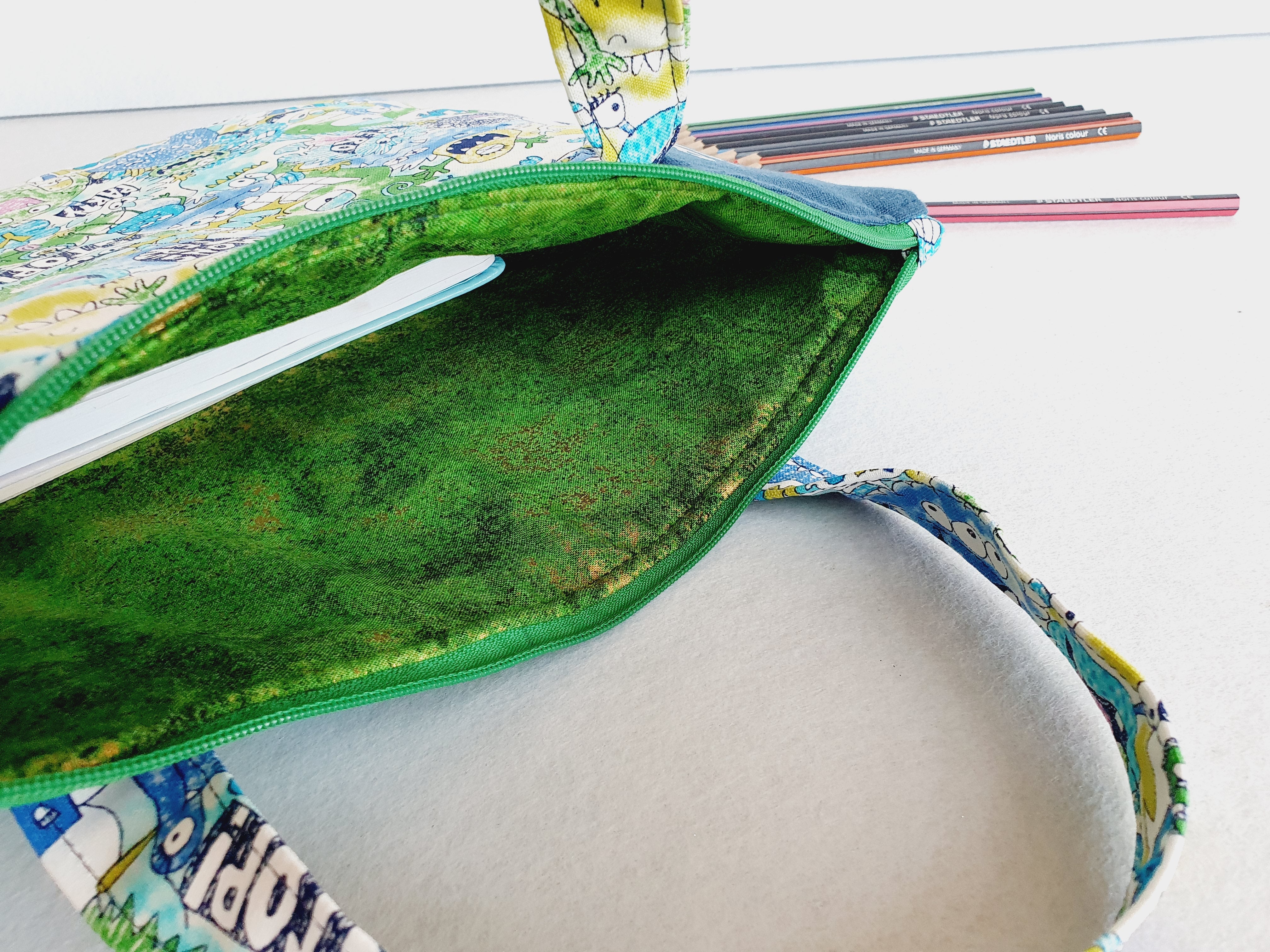 Personalized friendly monsters inspired library and laptop bag with glow-in-the-dark name