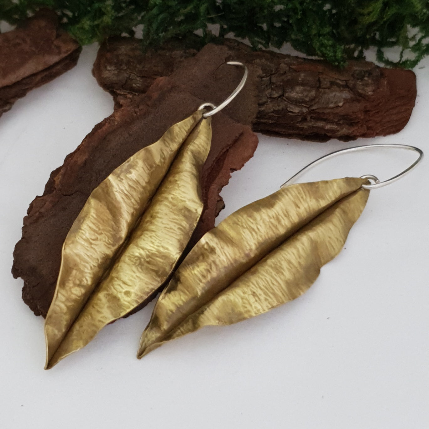 Golden brass leaf earrings