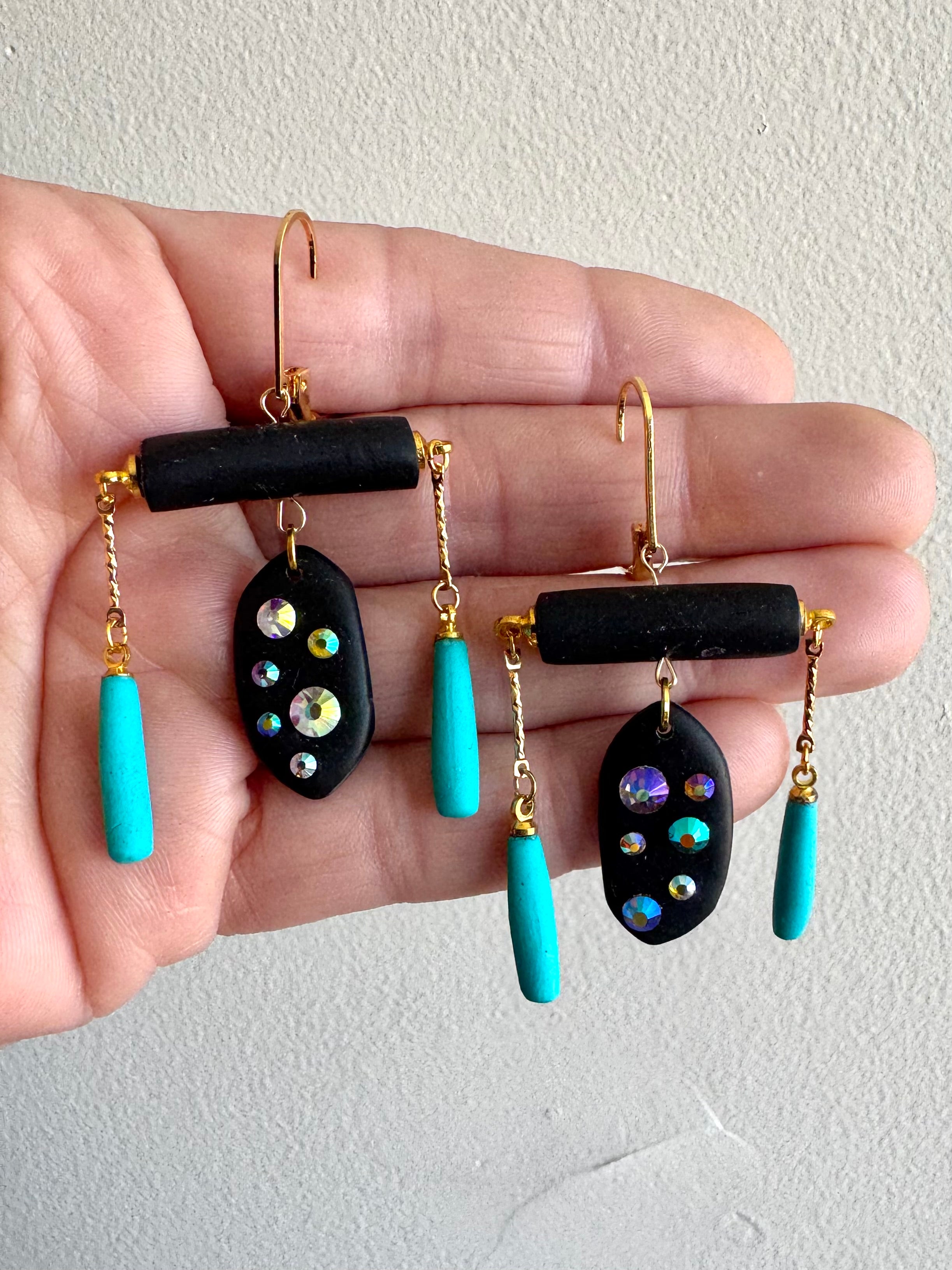 Black rod earrings with holographic gems