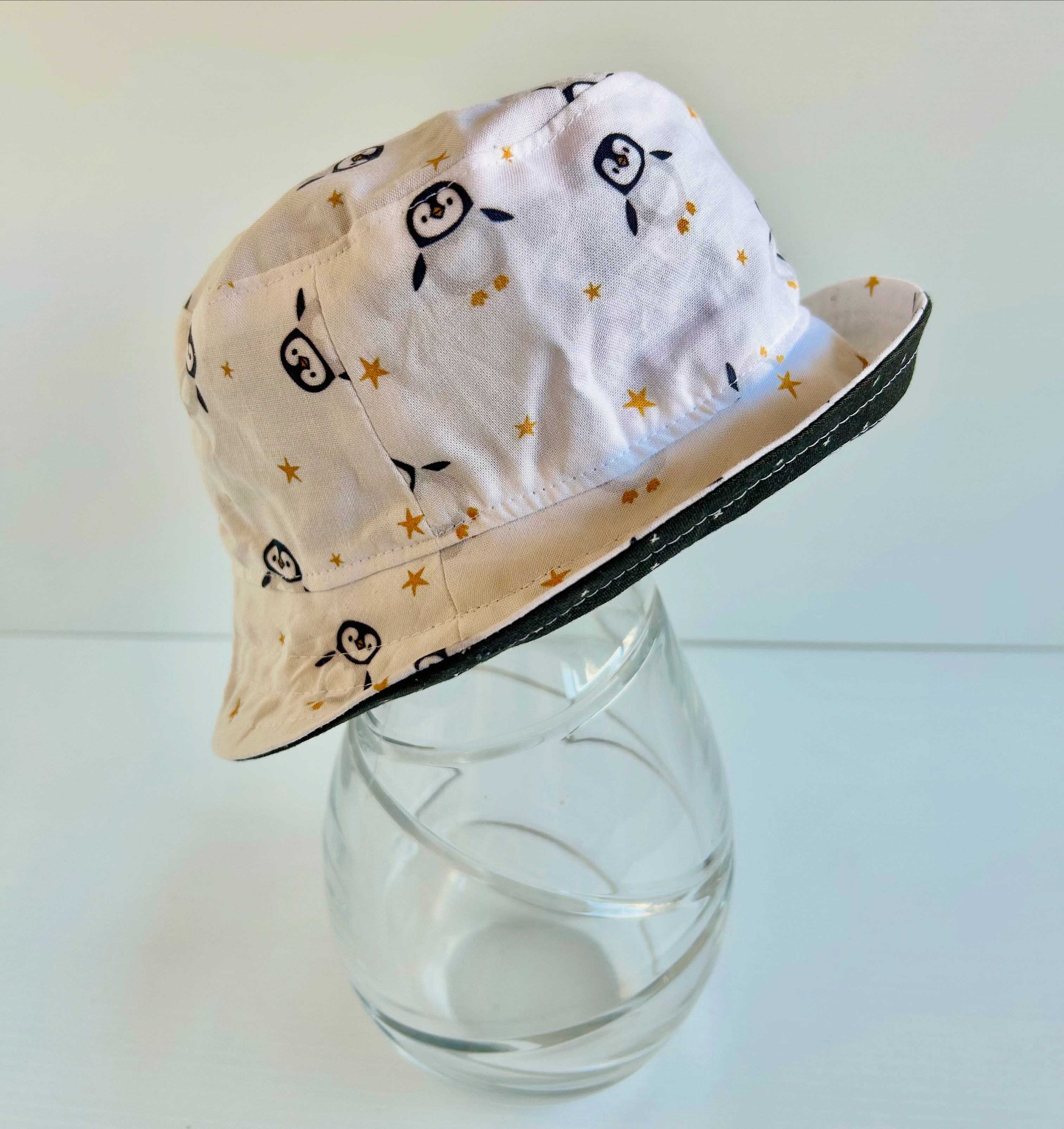 Summer hat in cute penguin fabric
