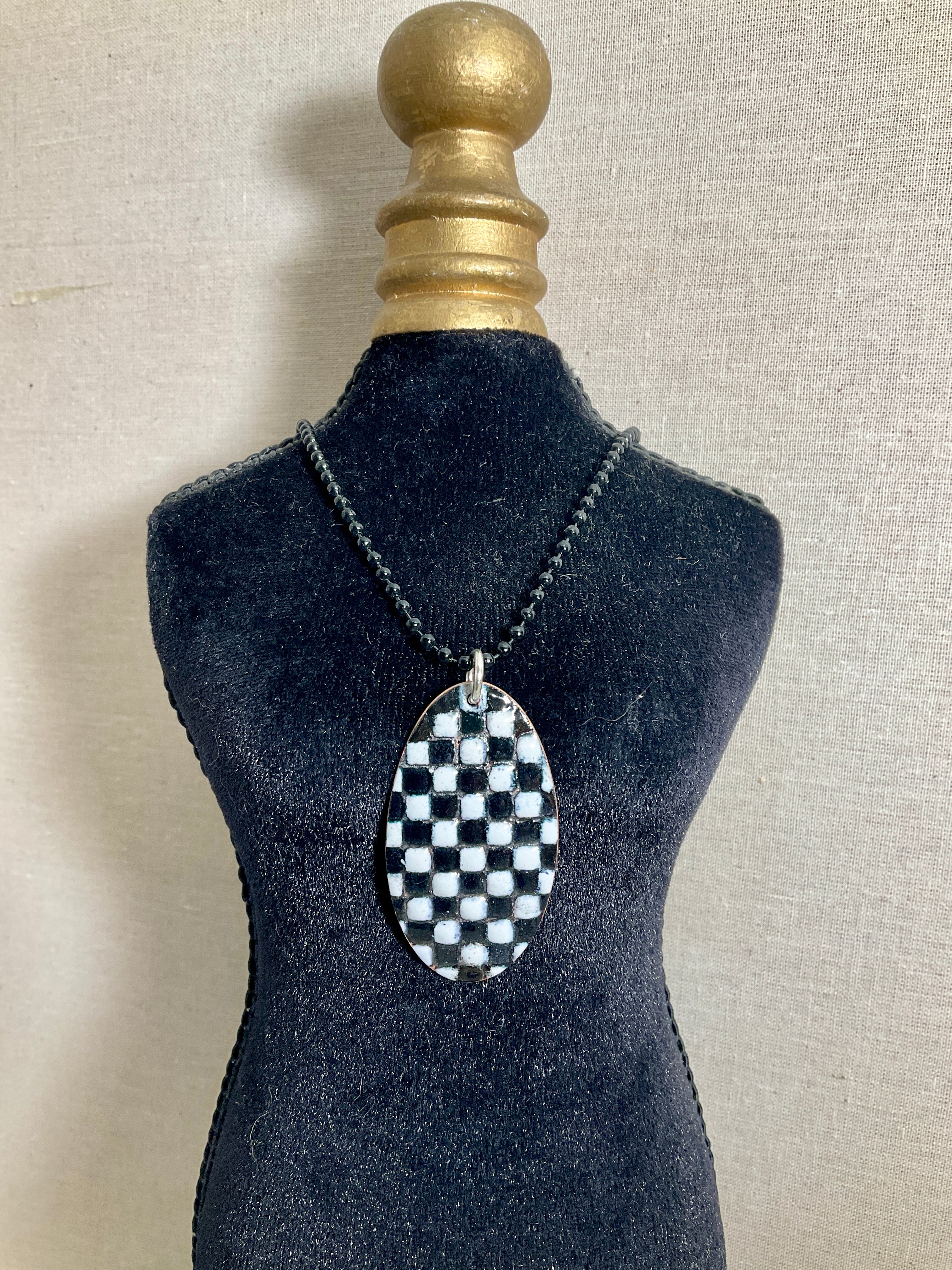Black and white patchwork enamel pendant. Copper and enamel