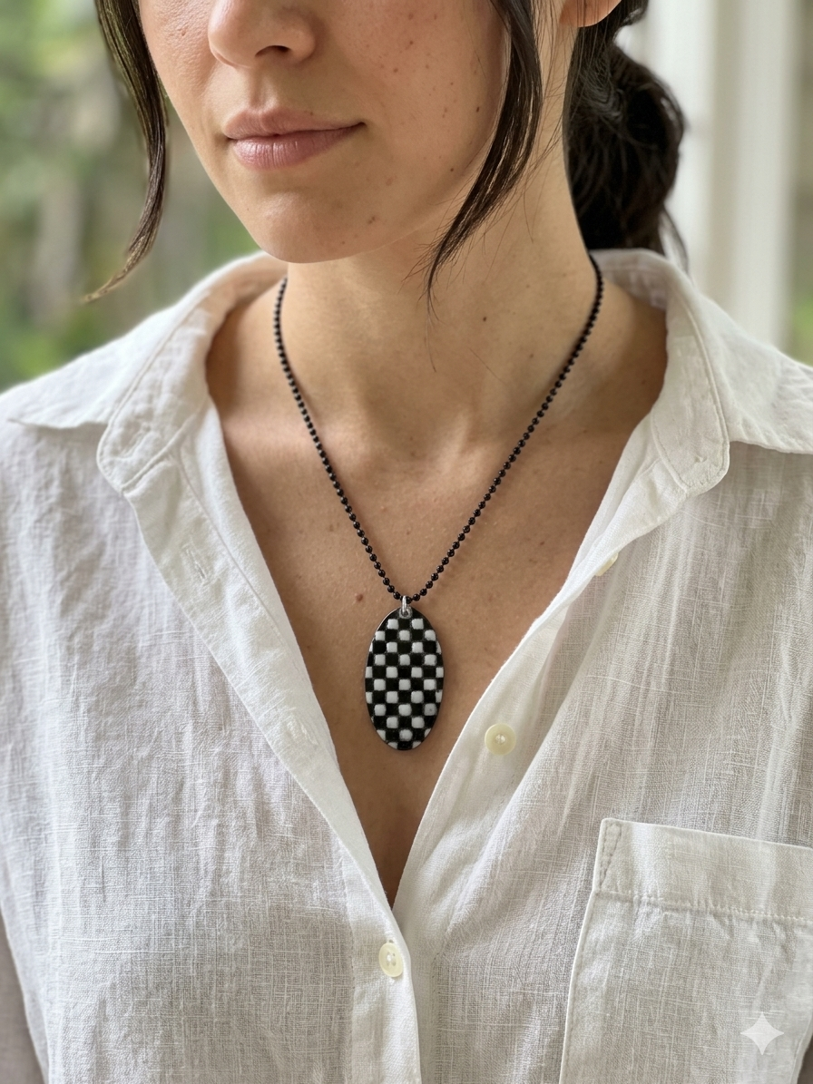Black and white patchwork enamel pendant. Copper and enamel