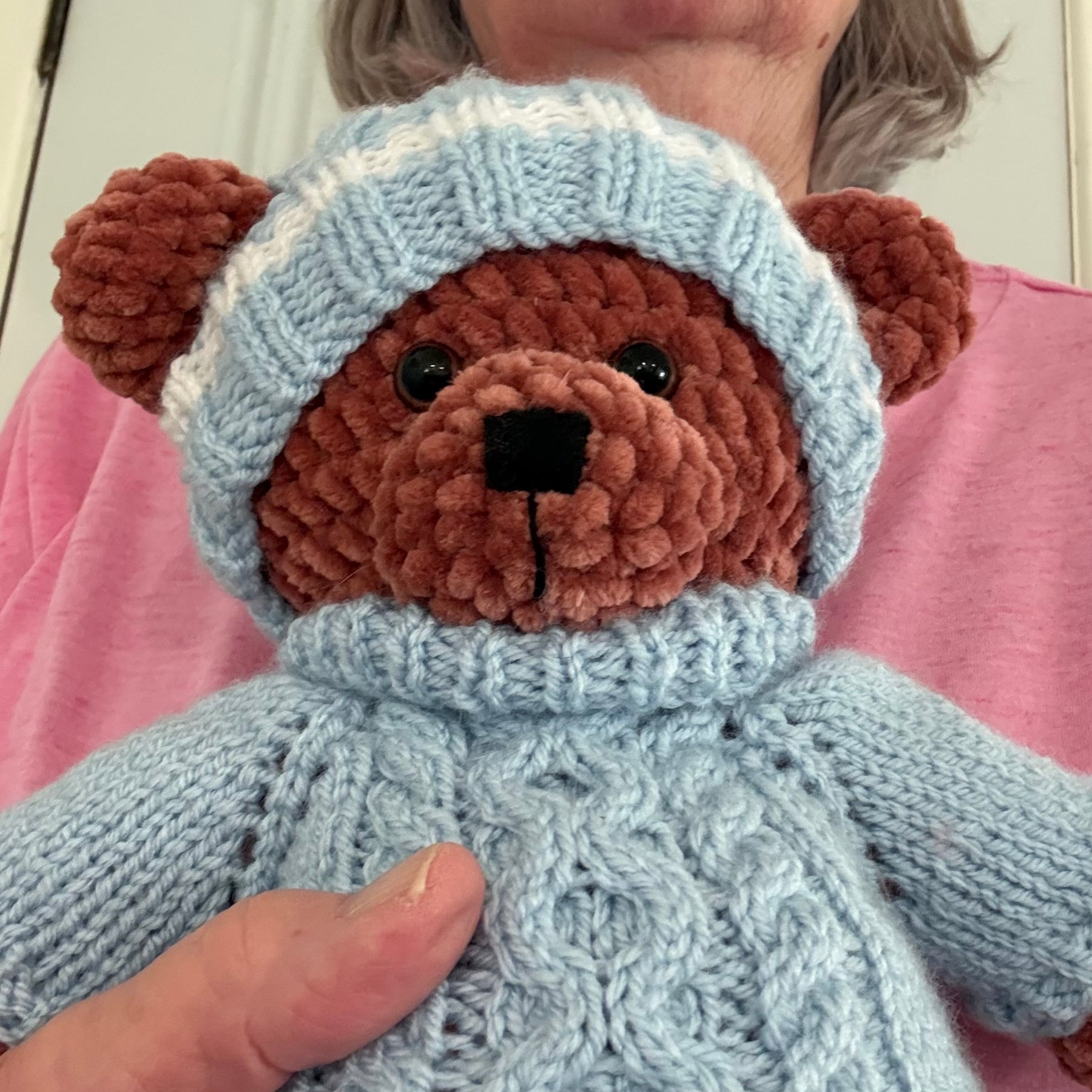 Crochet bear , knitted clothes