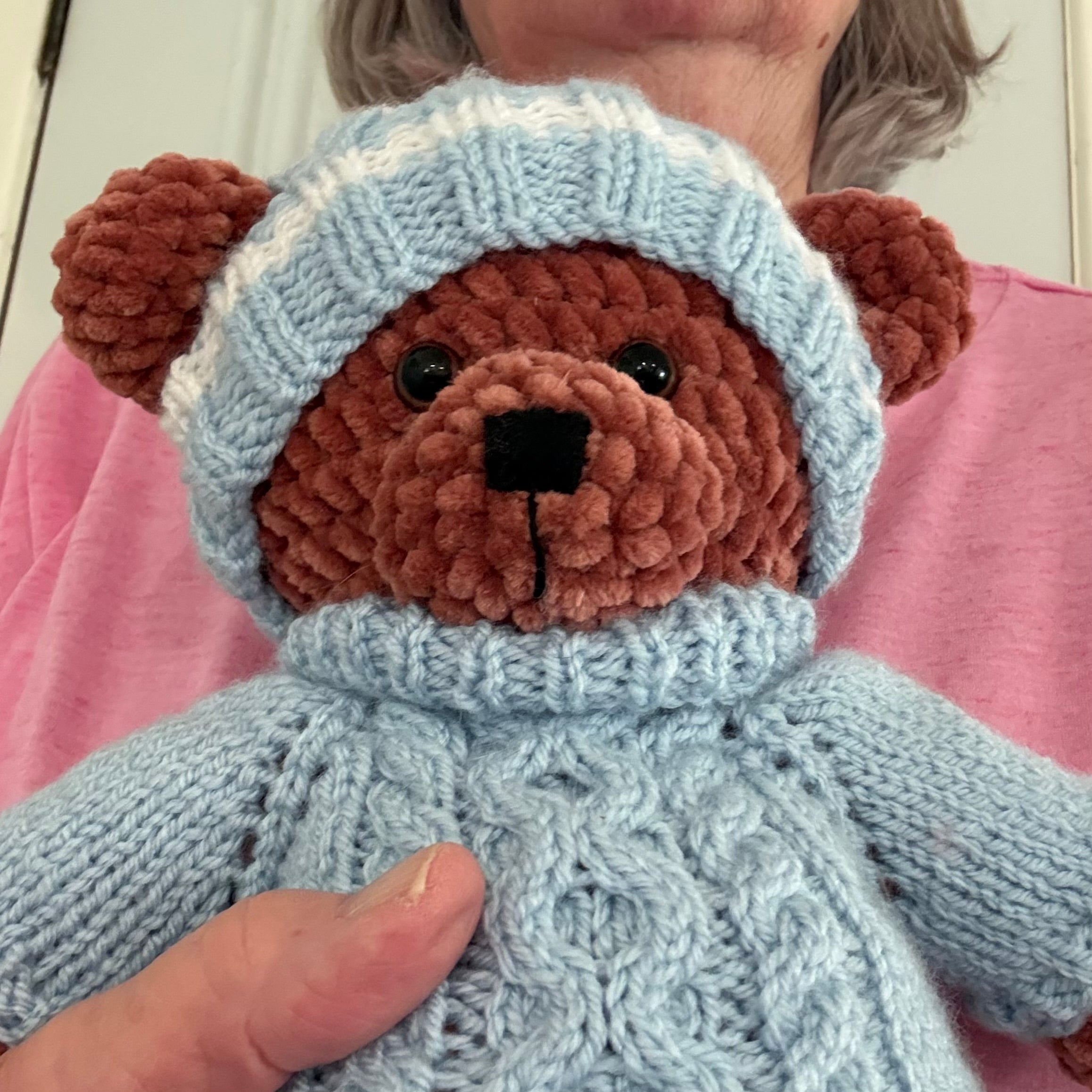 Crochet bear , knitted clothes