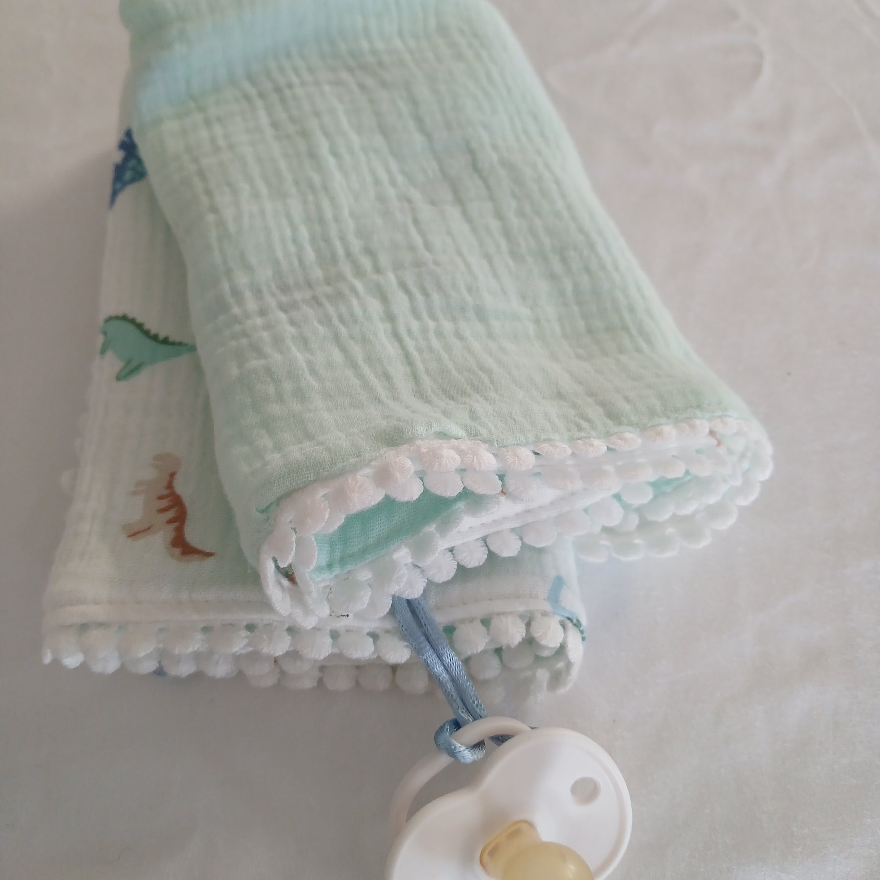 Handmade Double Gauze Dummy Comforter  - 35x31cm with Beechwood Teething Ring -Dinosaurs , Light Mint