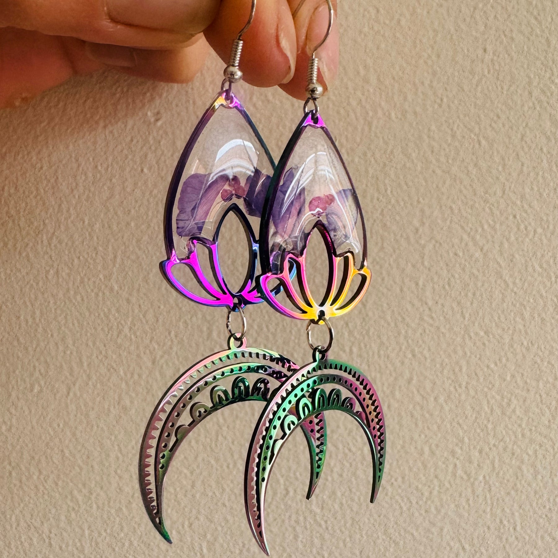 Iridescent rainbow resin earrings with pressed flowers