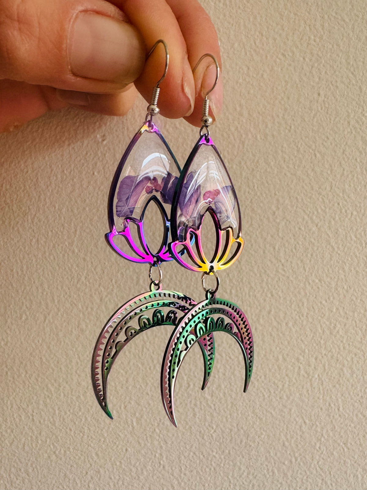 Iridescent rainbow resin earrings with pressed flowers