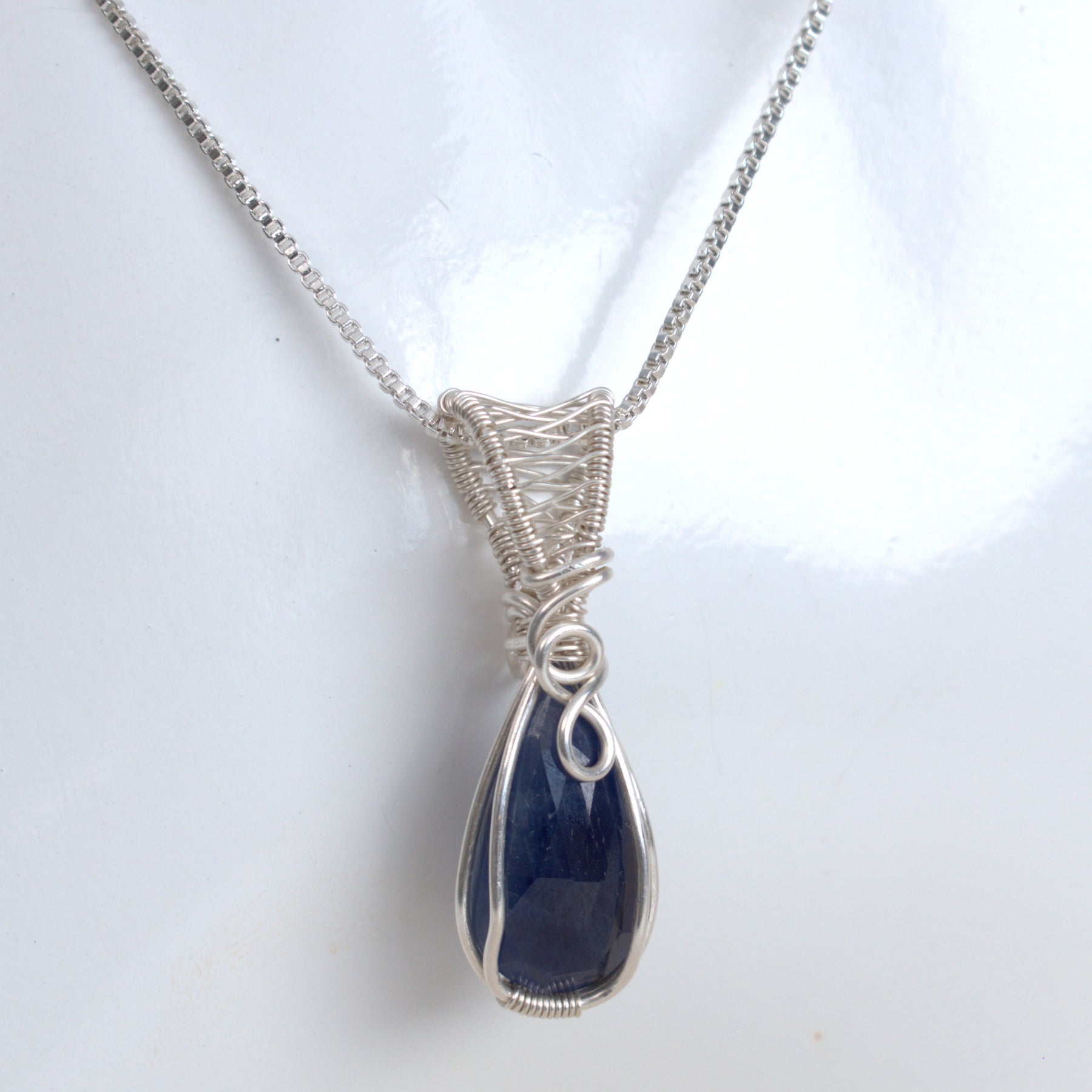 After Dark – Blue Sapphire Pendant in Silver-Filled Wire
