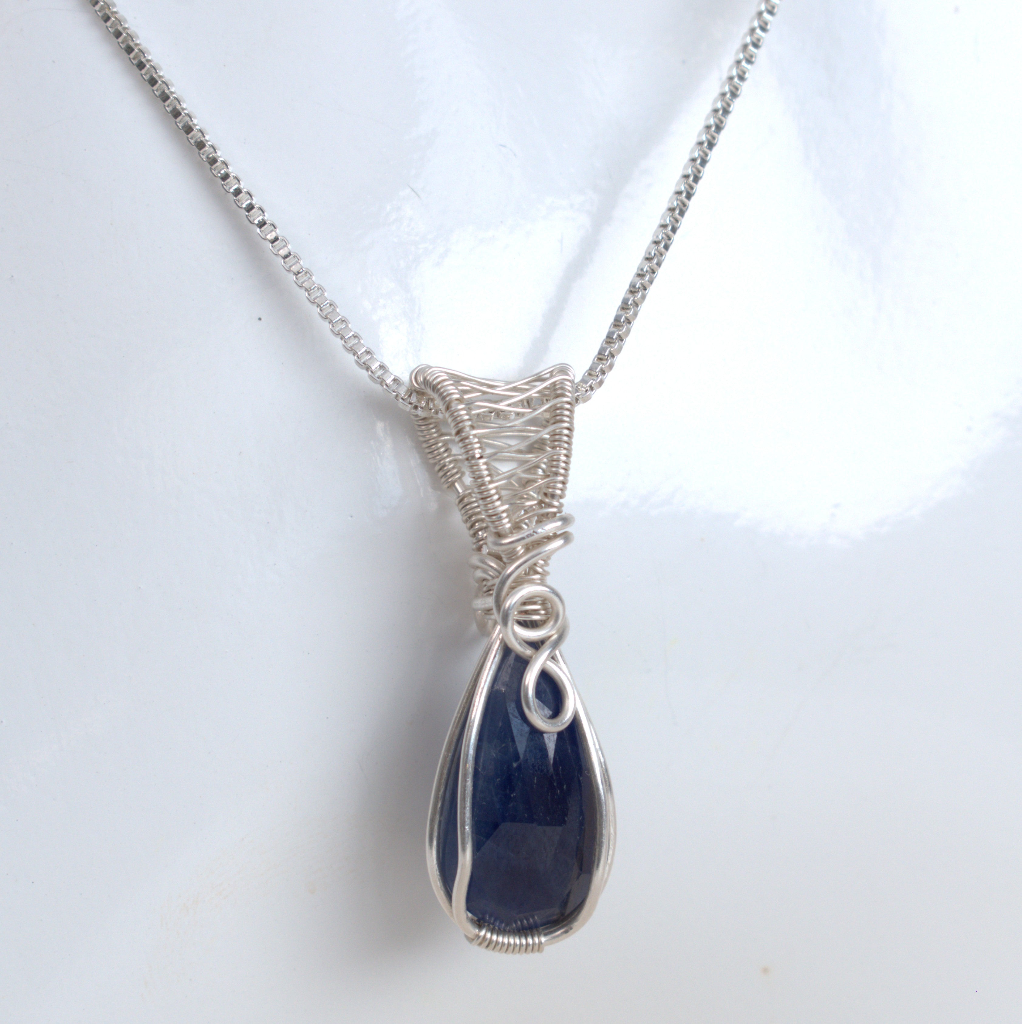 After Dark – Blue Sapphire Pendant in Silver-Filled Wire