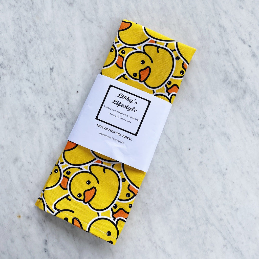 Rubber ducks tea towel.