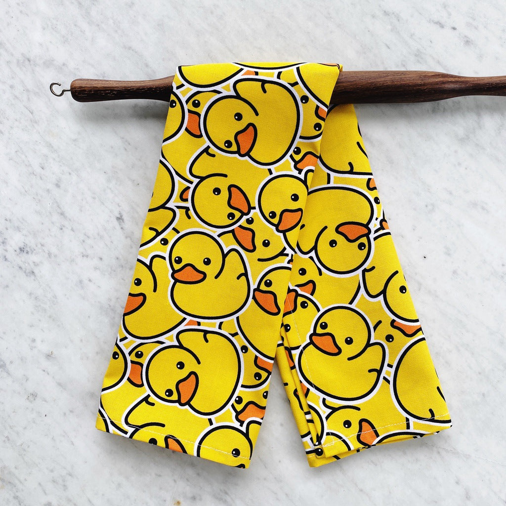 Rubber ducks tea towel.