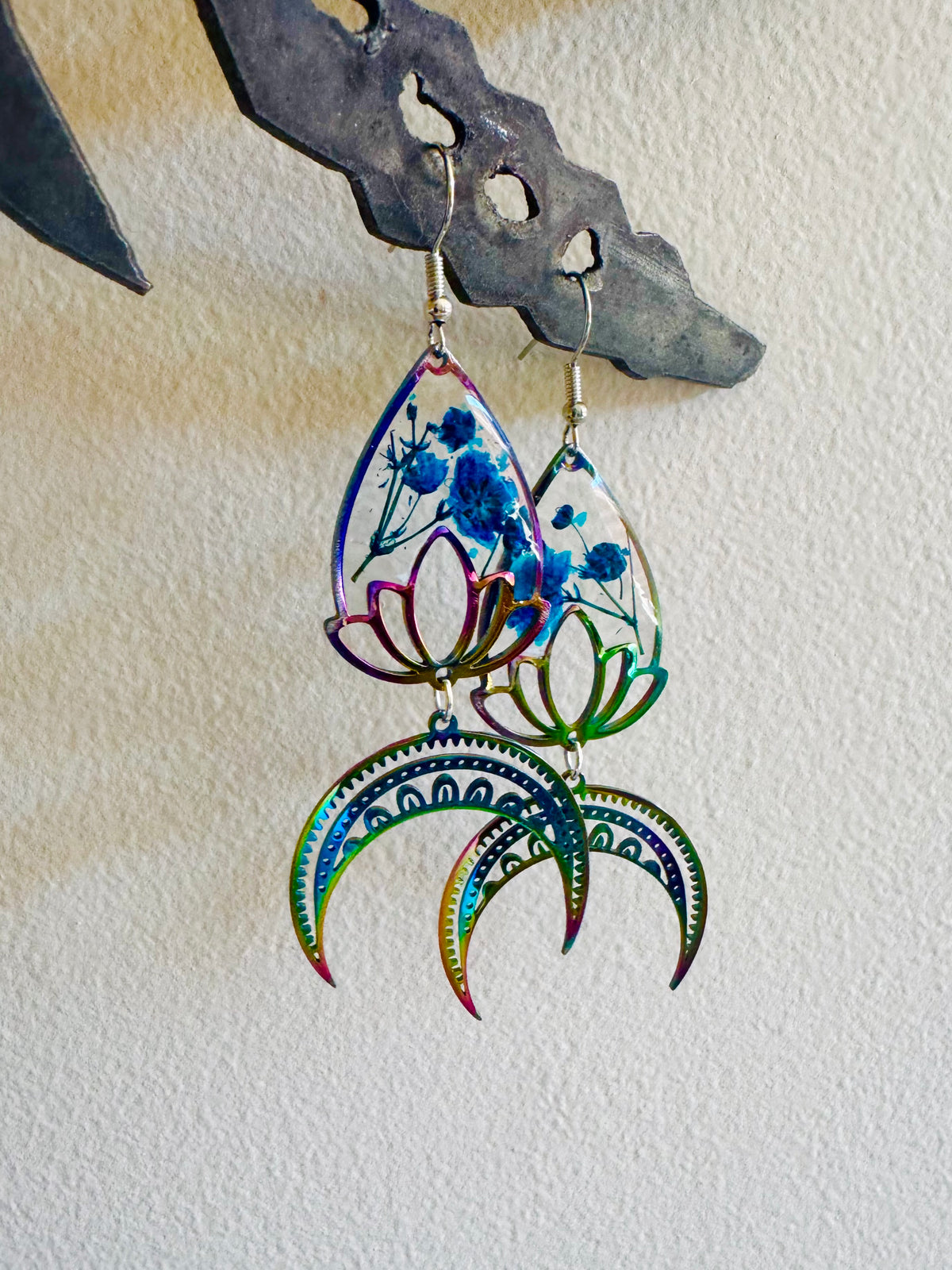 Iridescent rainbow resin earrings with pressed flowers